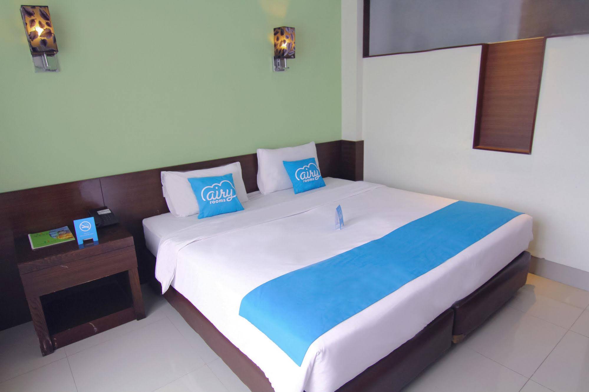 Bamboo Inn Hotel & Cafe by Airy Rooms