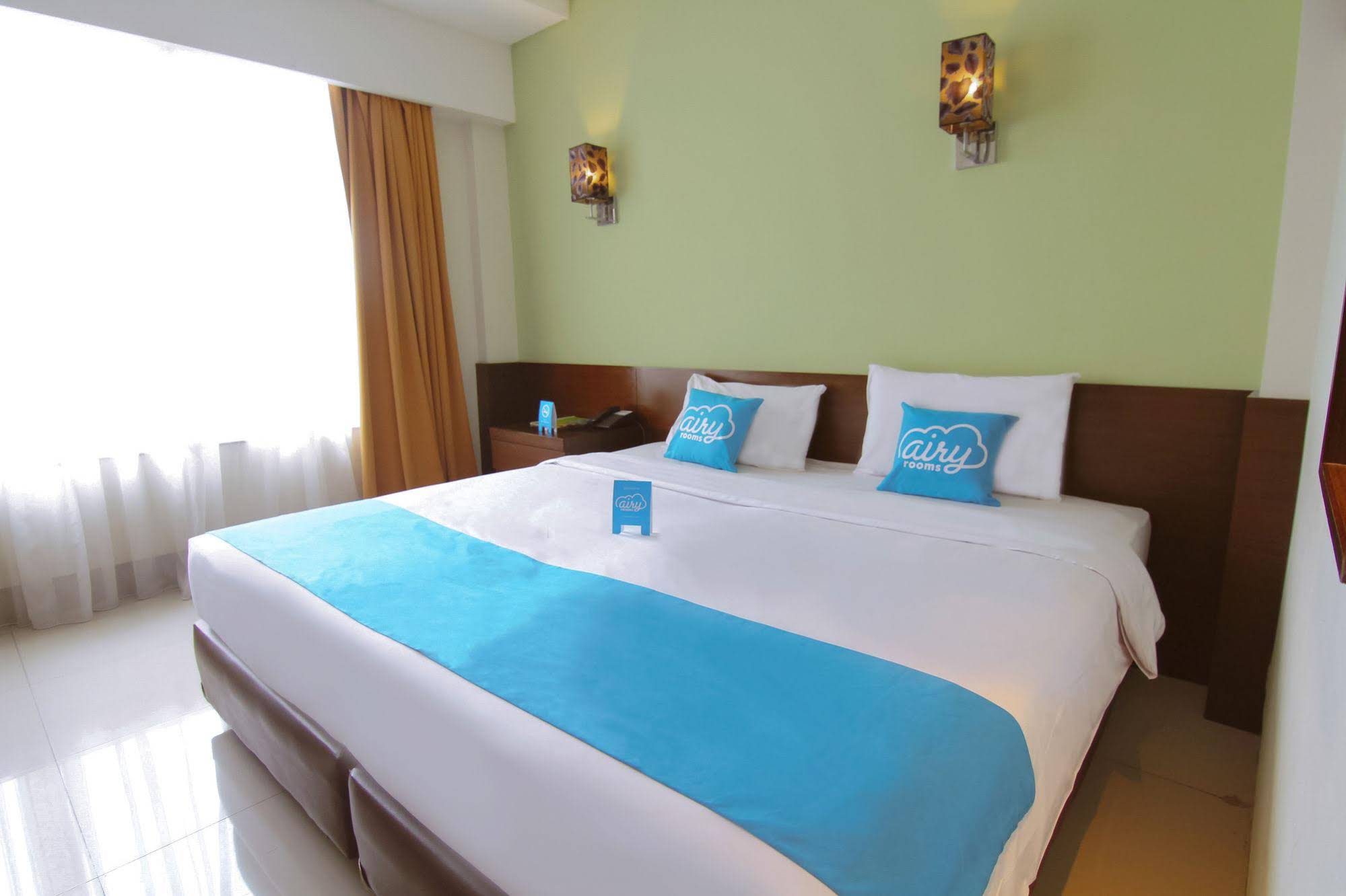 Bamboo Inn Hotel & Cafe by Airy Rooms
