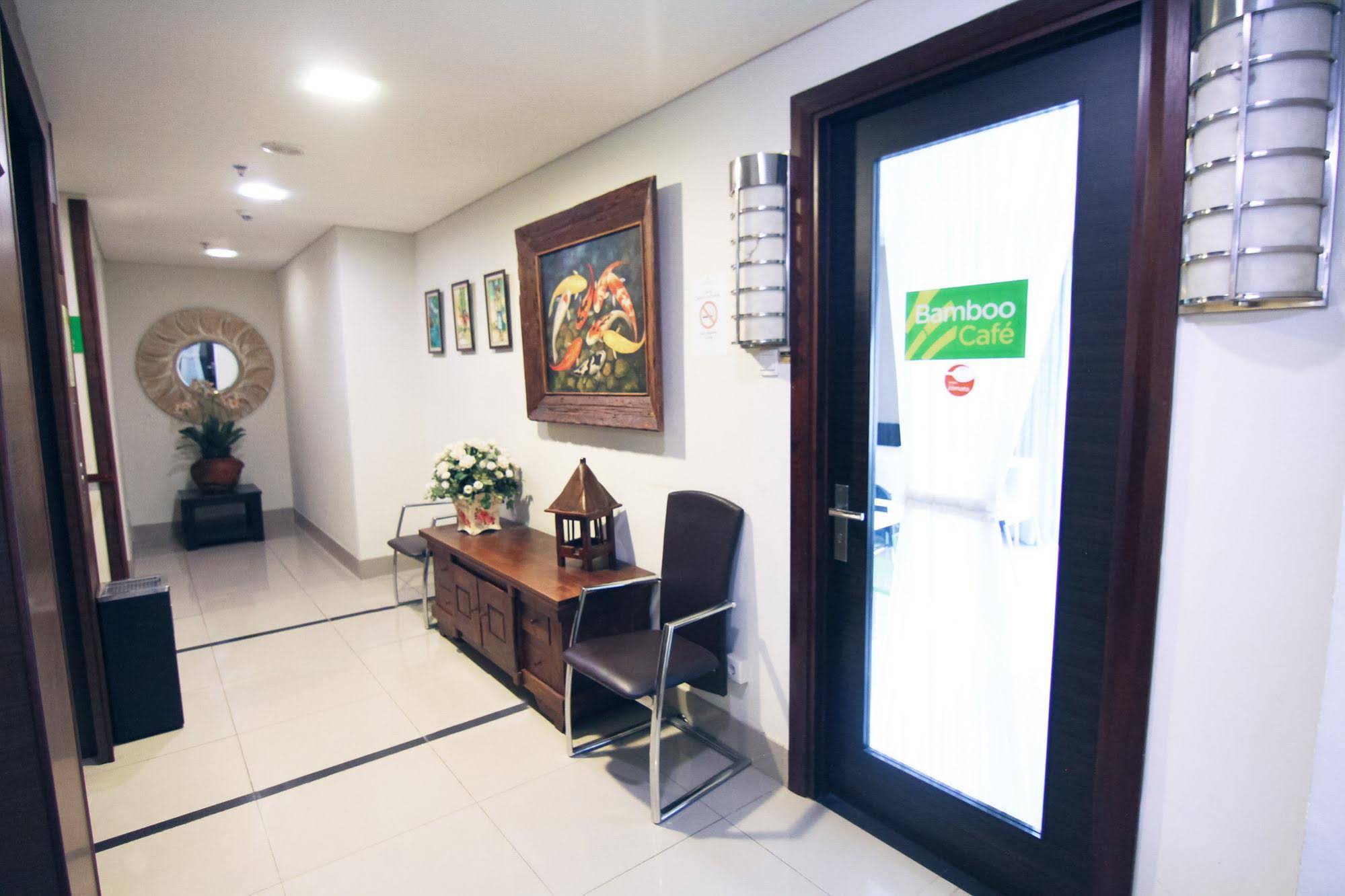 Bamboo Inn Hotel & Cafe by Airy Rooms