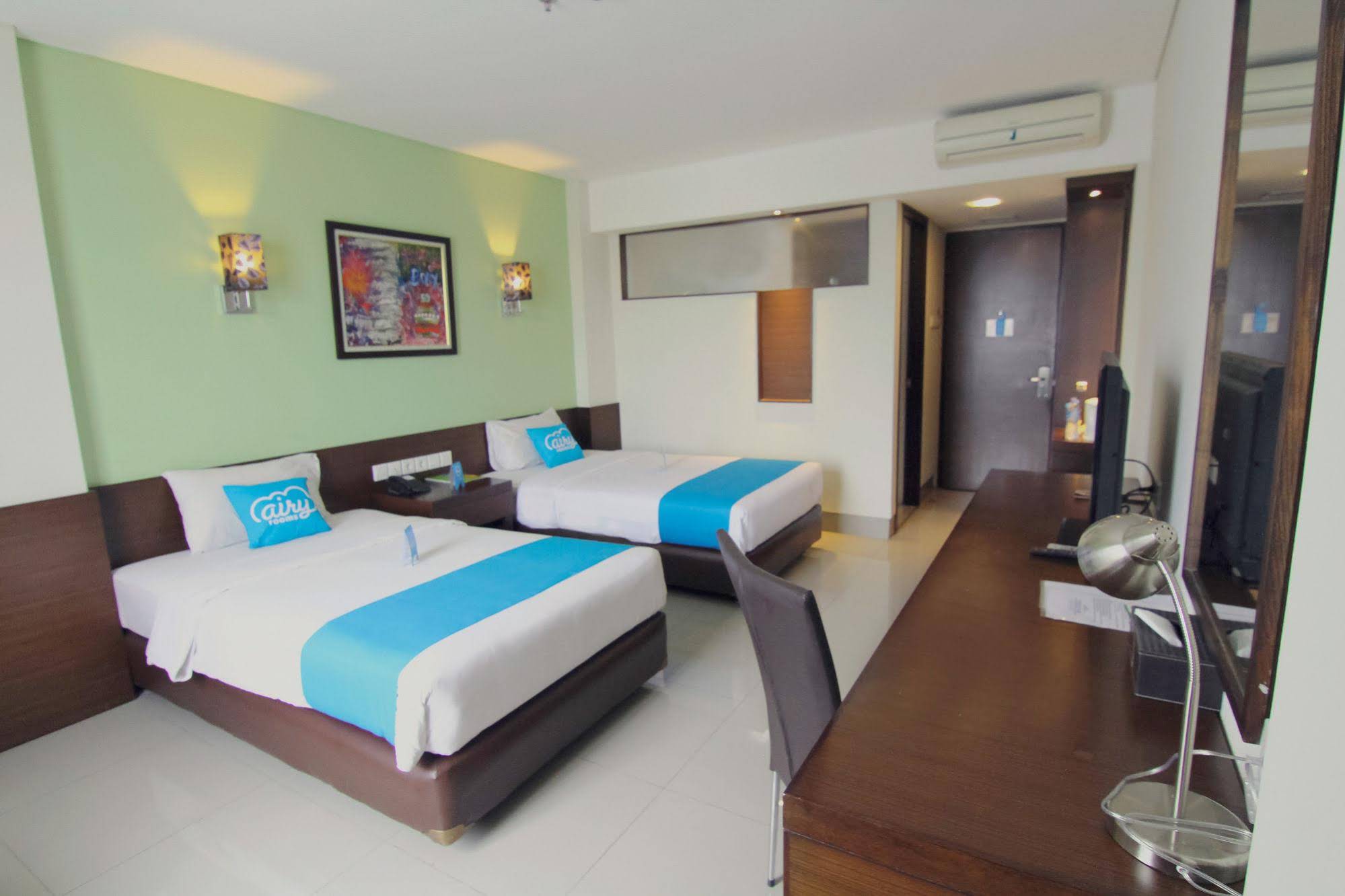 Bamboo Inn Hotel & Cafe by Airy Rooms