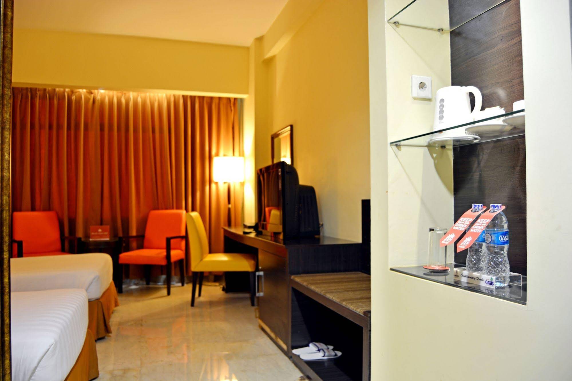 Grand Asia Hotel by ZEN Rooms