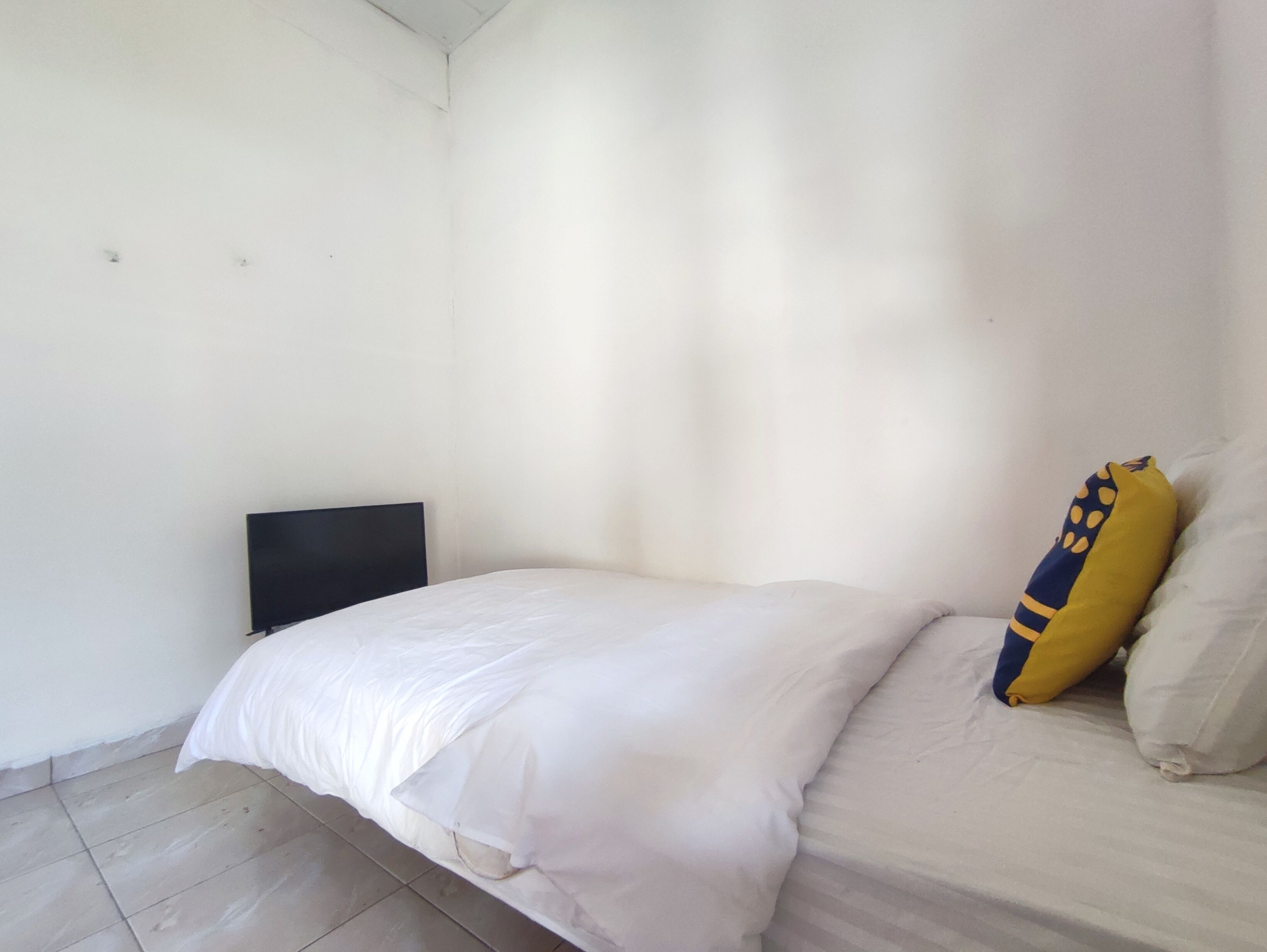 SPOT ON 93016 Griya Kamboja Cijantung