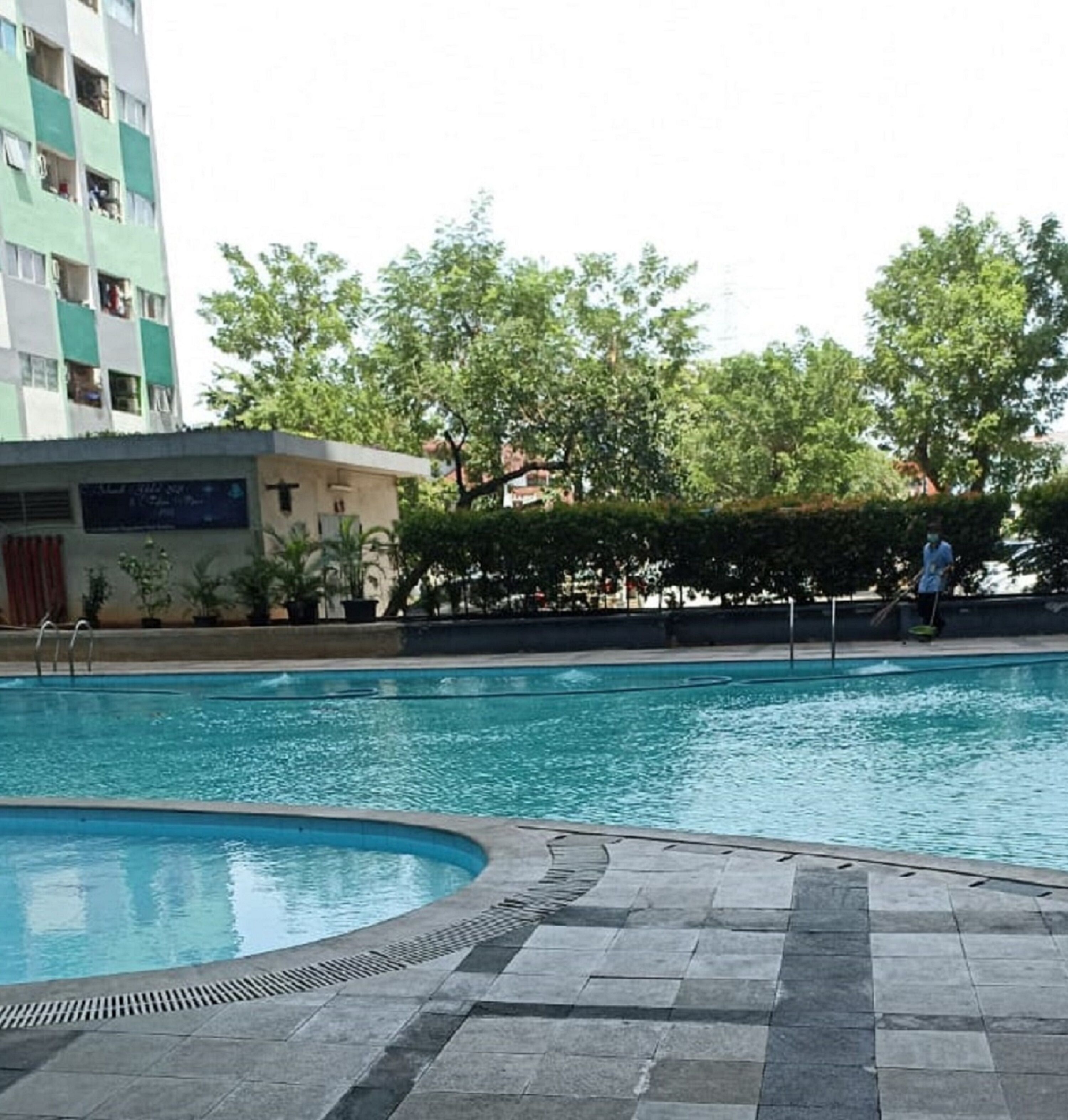 The Roomos Hotel Apartemen