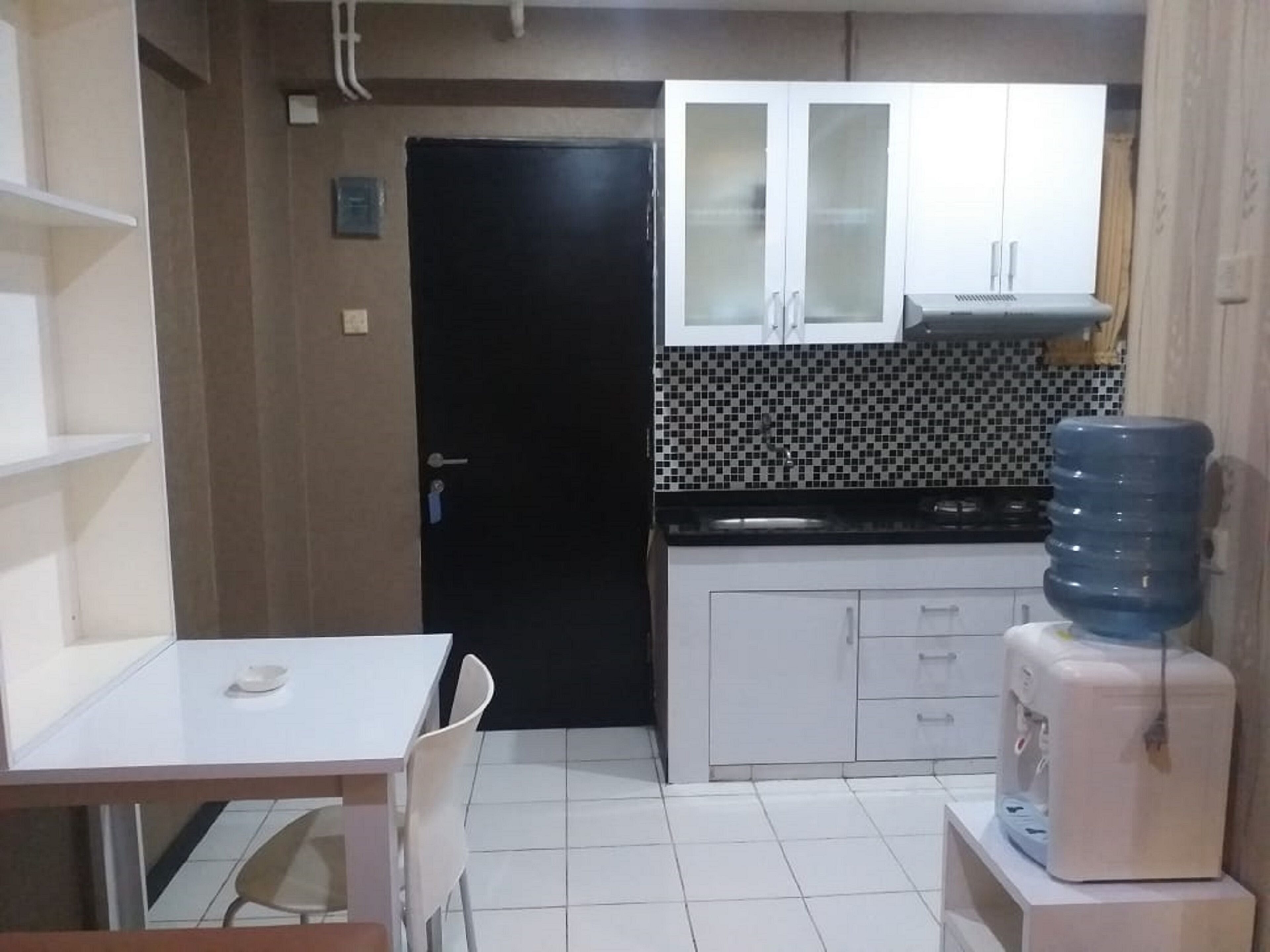 The Roomos Hotel Apartemen