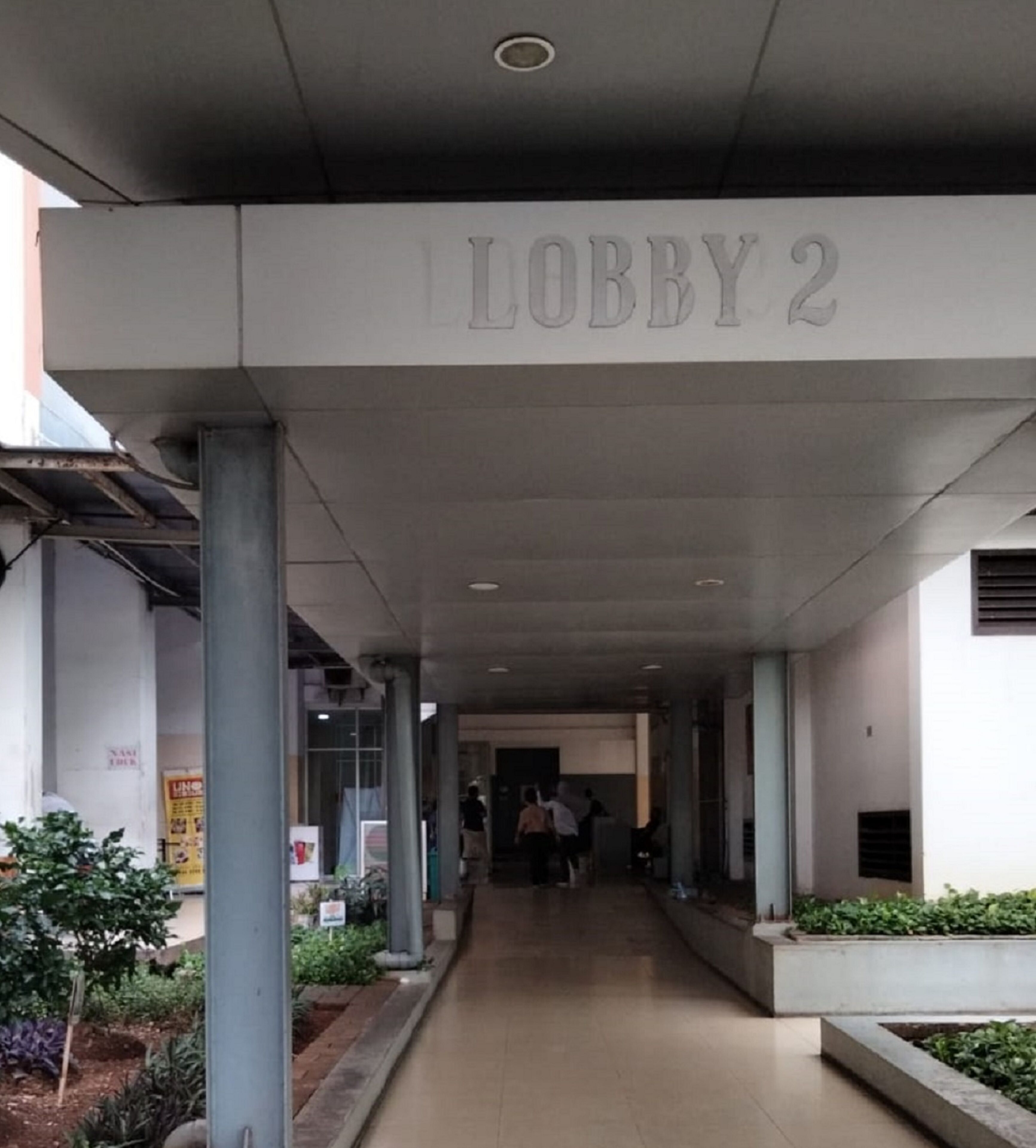 The Roomos Hotel Apartemen