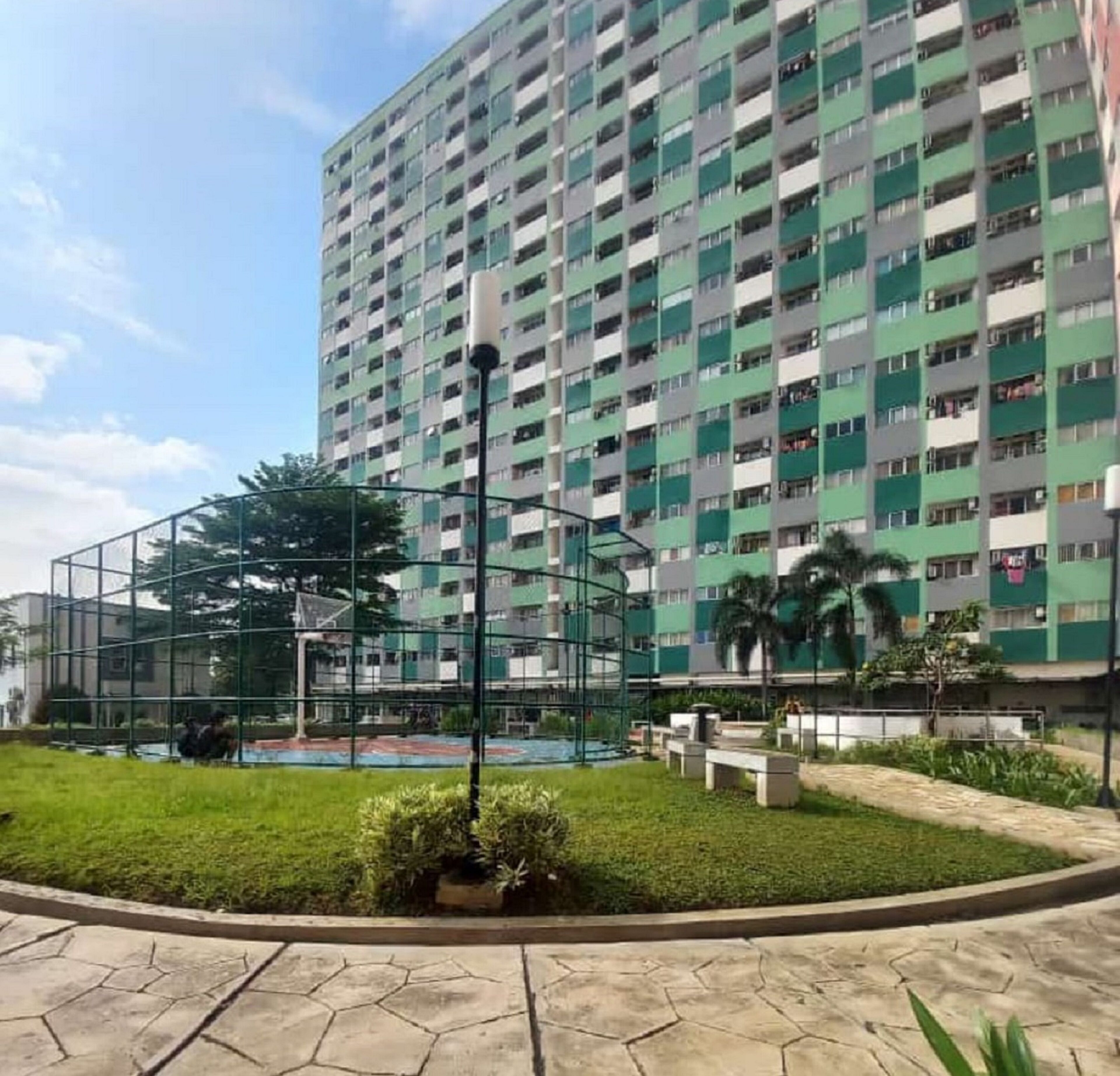 The Roomos Hotel Apartemen