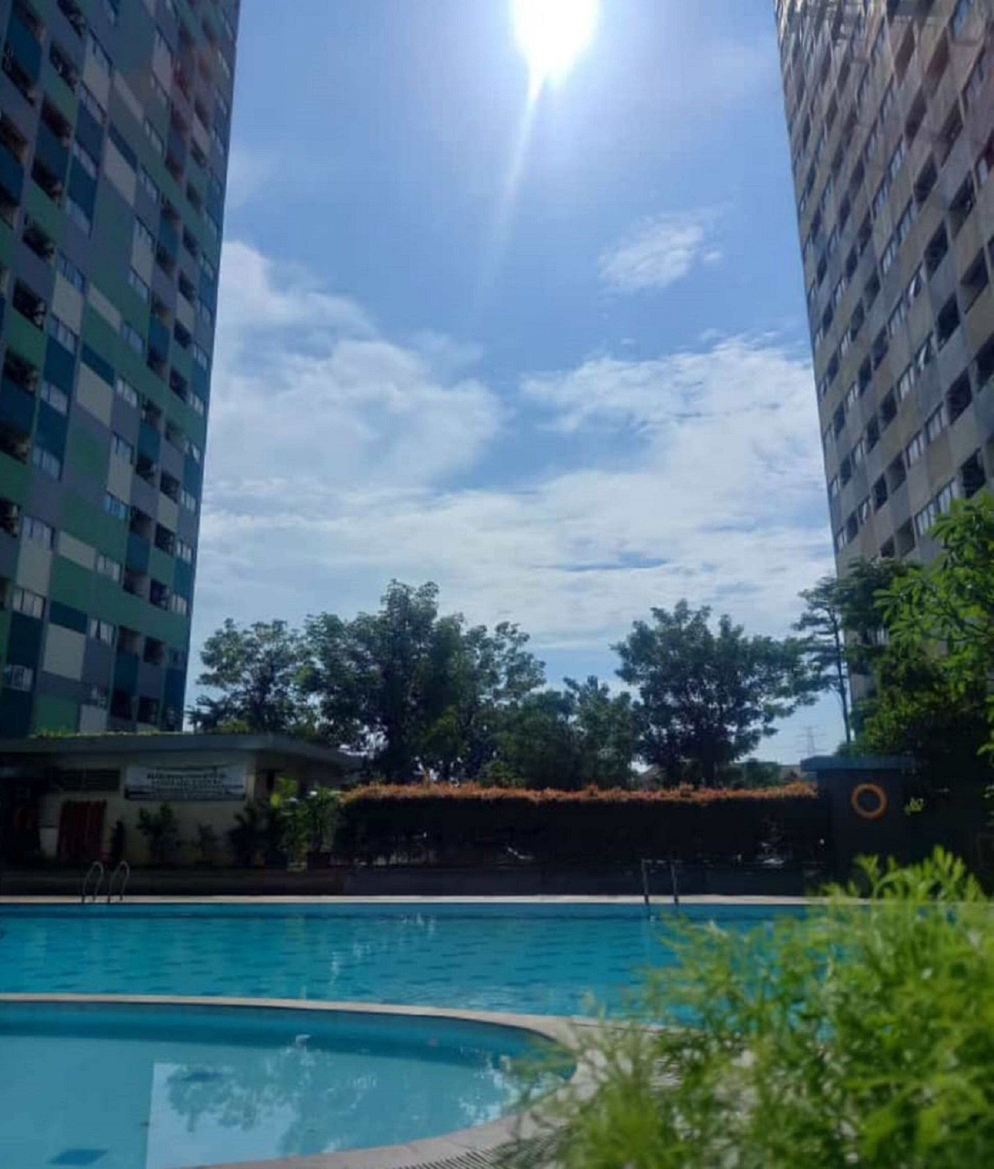 The Roomos Hotel Apartemen