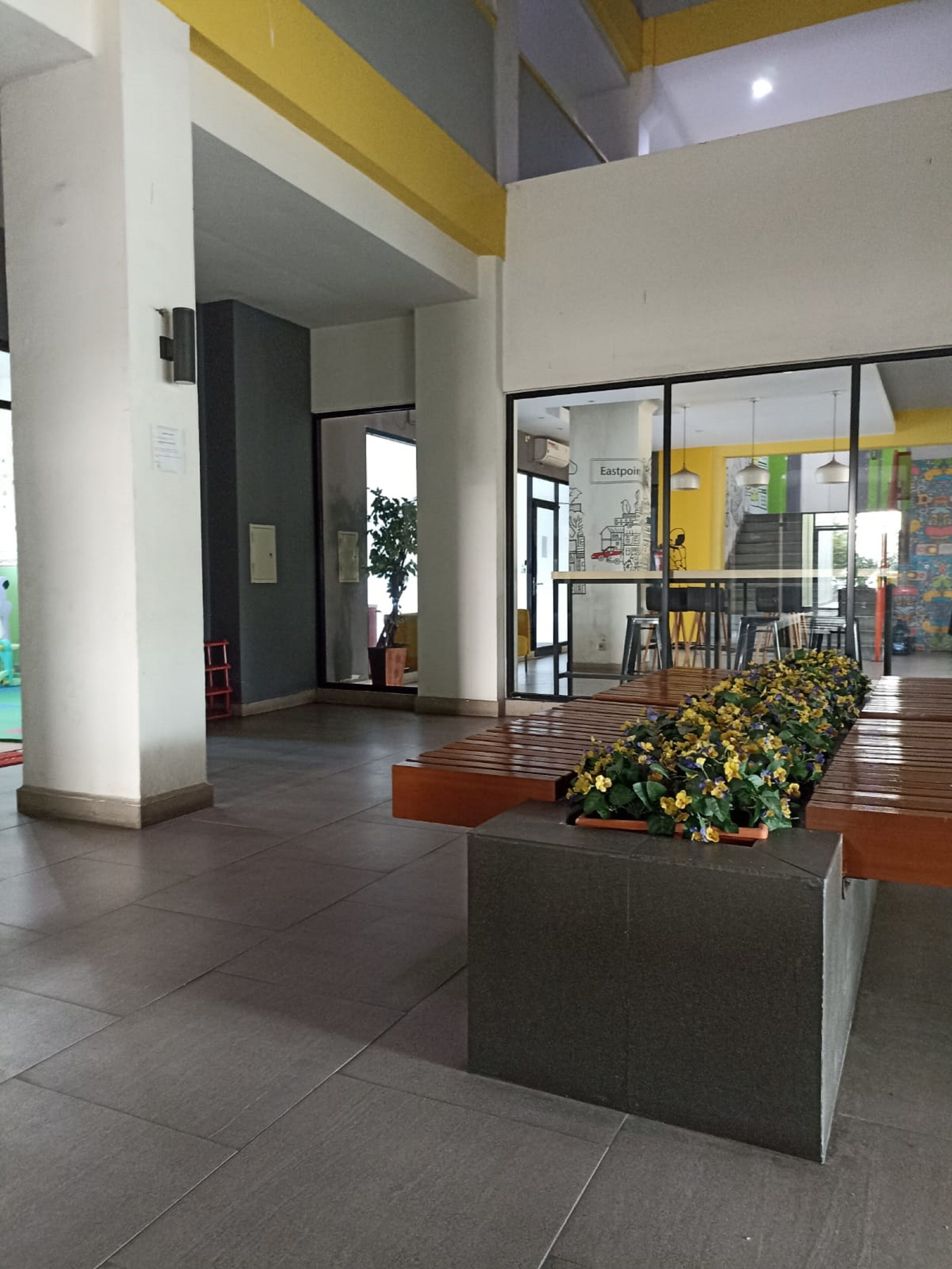 The Roomos Hotel Apartemen