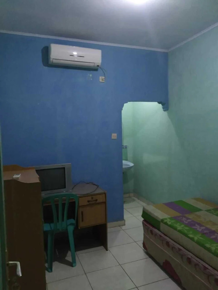 Wisma Kurnia Raharja by OYO