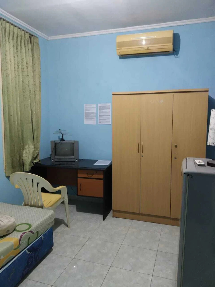 Wisma Kurnia Raharja by OYO