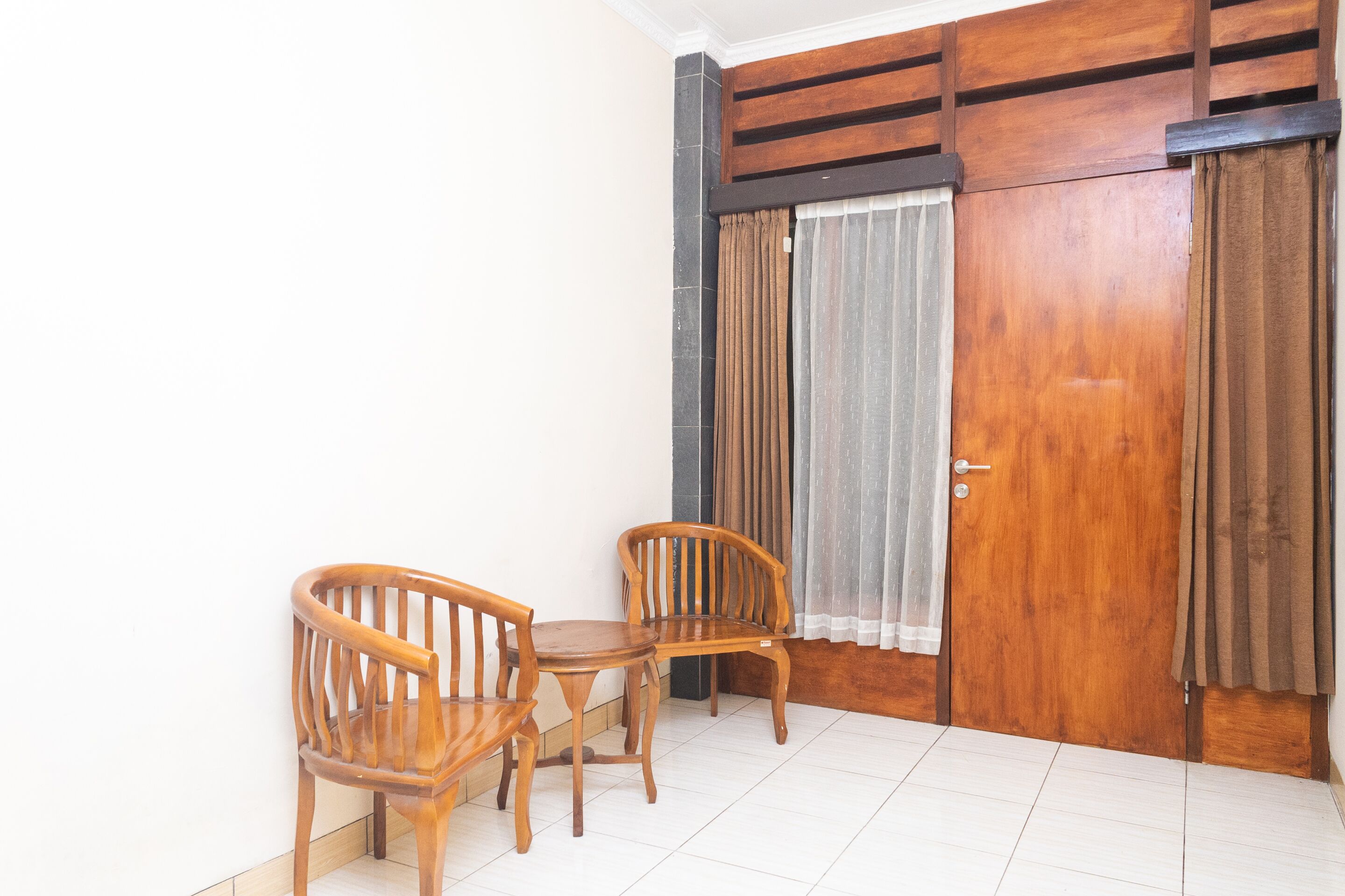 Wisma Family Raya by OYO Rooms