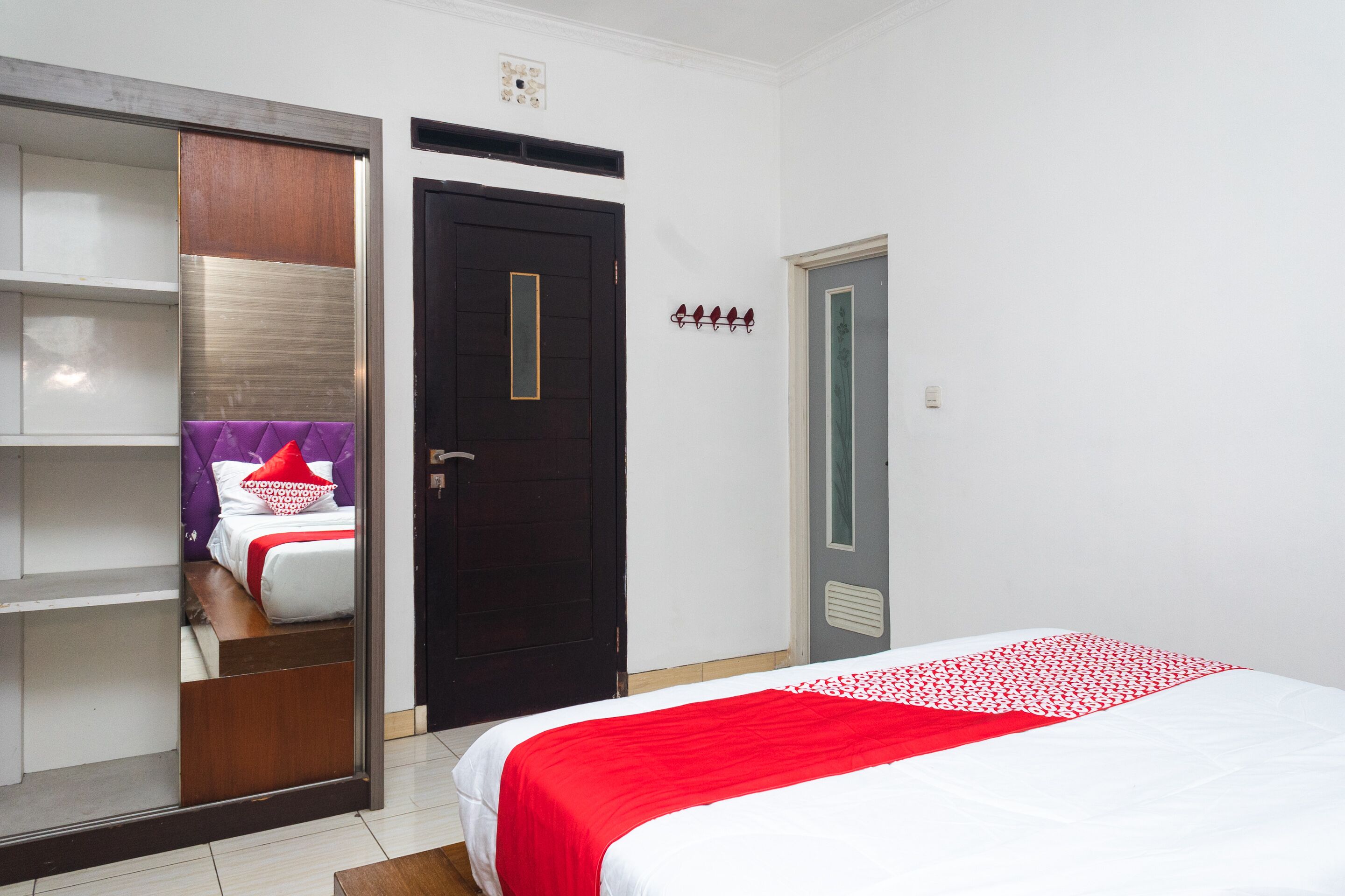 Wisma Family Raya by OYO Rooms