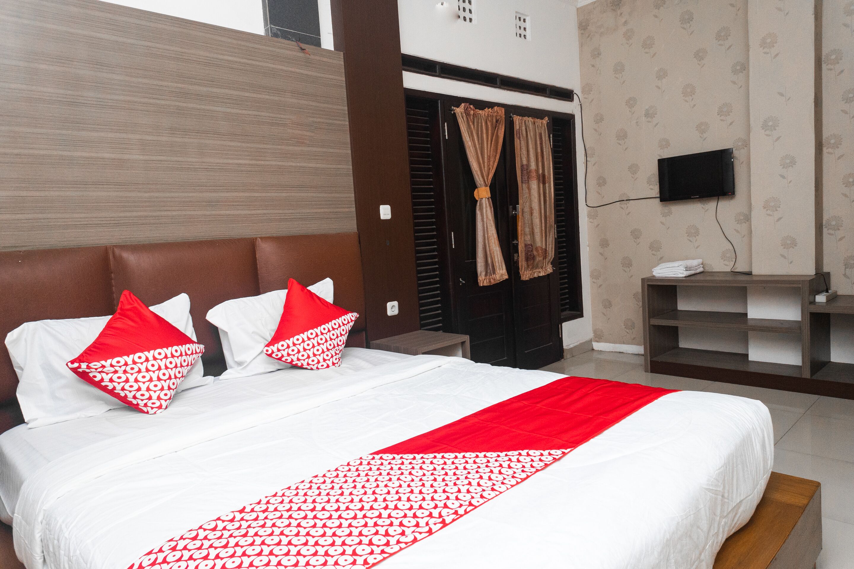 Wisma Family Raya by OYO Rooms