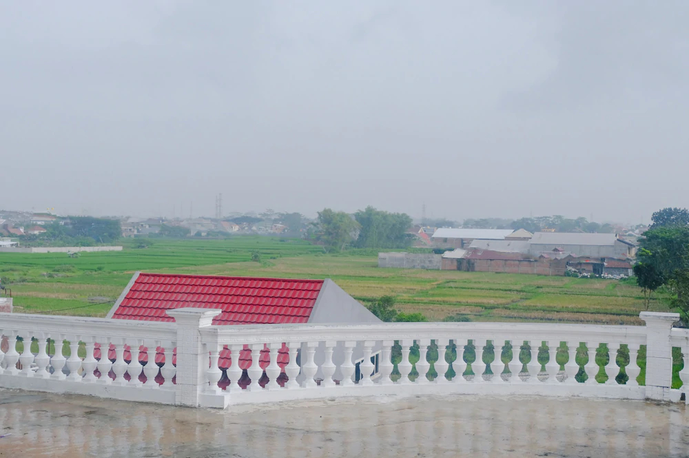 Hasanah Guest House Syariah De Saphire by OYO Rooms