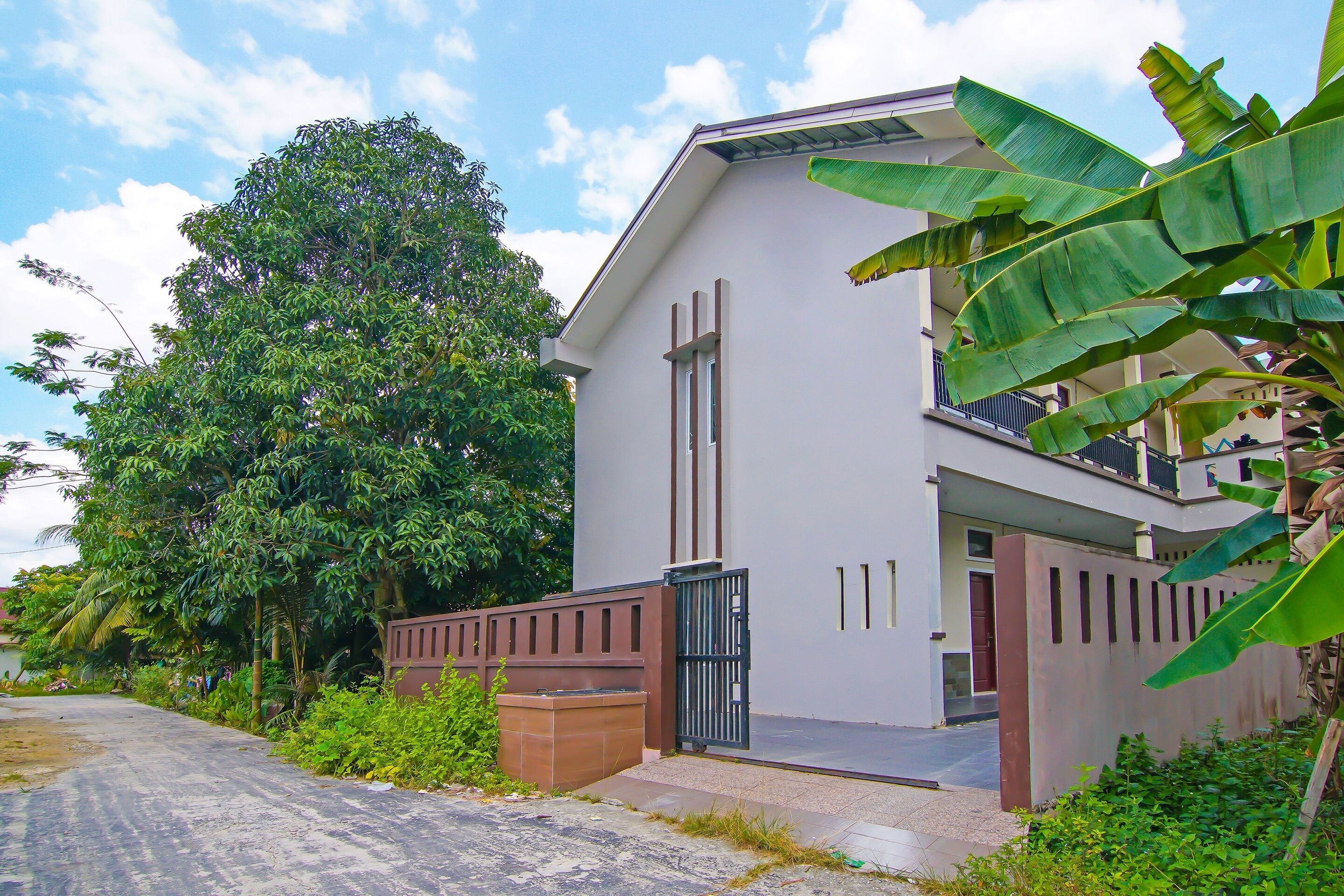 Spot On 92570 Putri Guest House Syariah