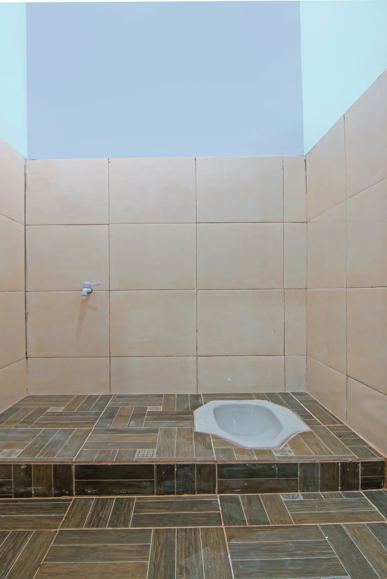 Spot On 92570 Putri Guest House Syariah