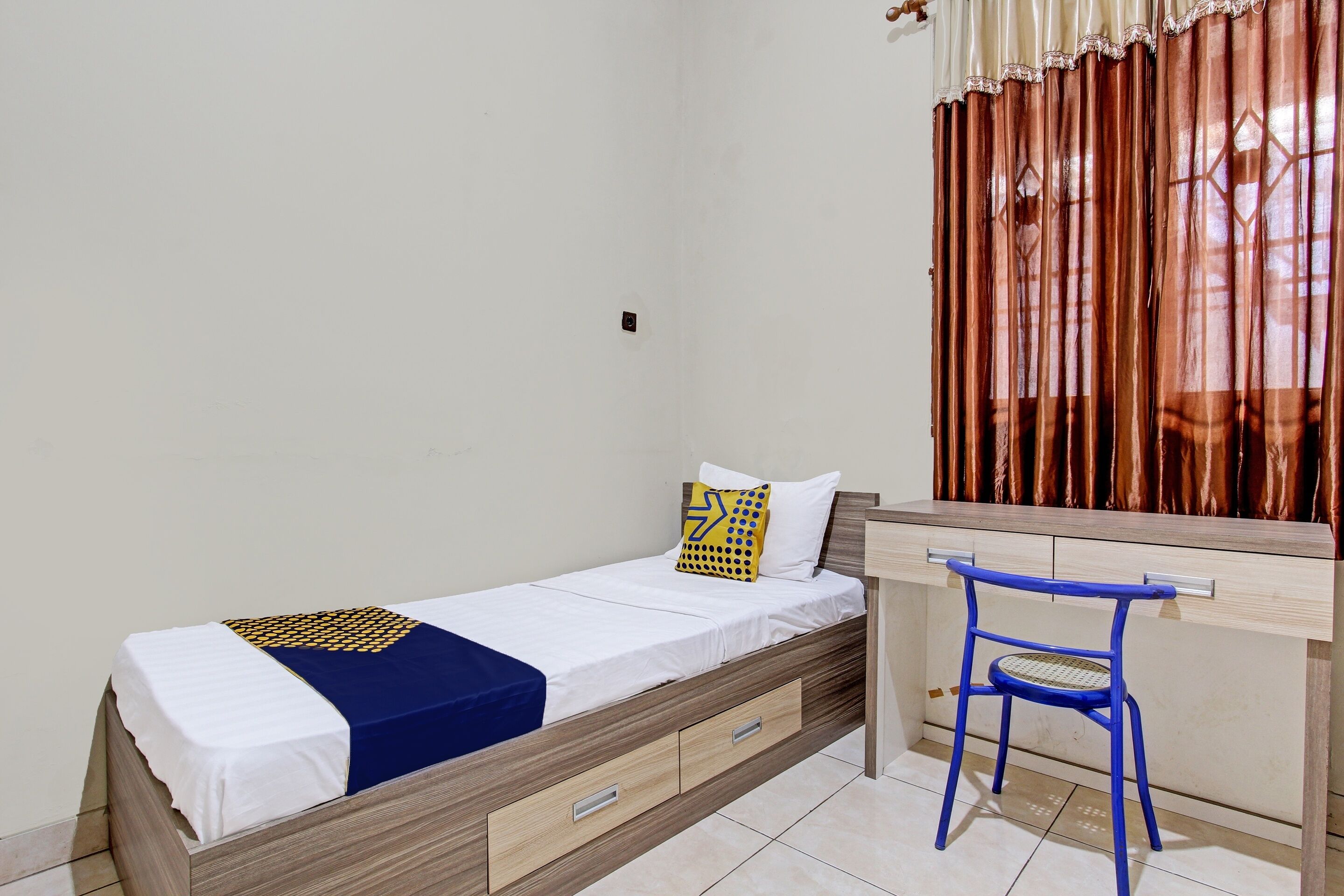 SPOT ON 92424 Wulan Homestay Syariah