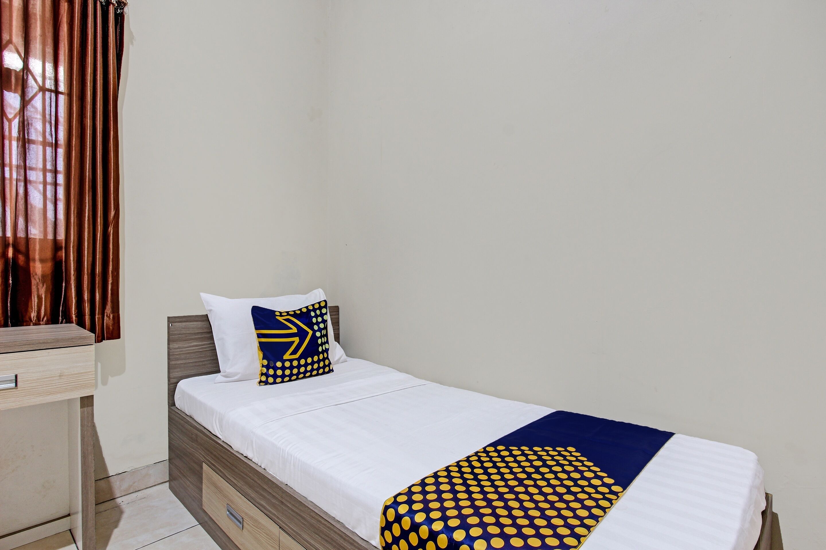 SPOT ON 92424 Wulan Homestay Syariah