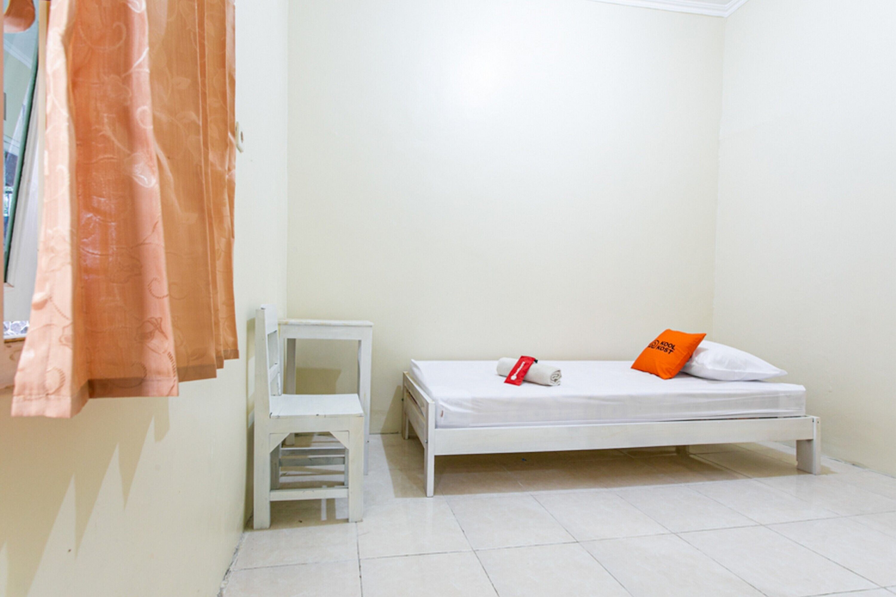 Kost Griya Hotasi by Reddoorz