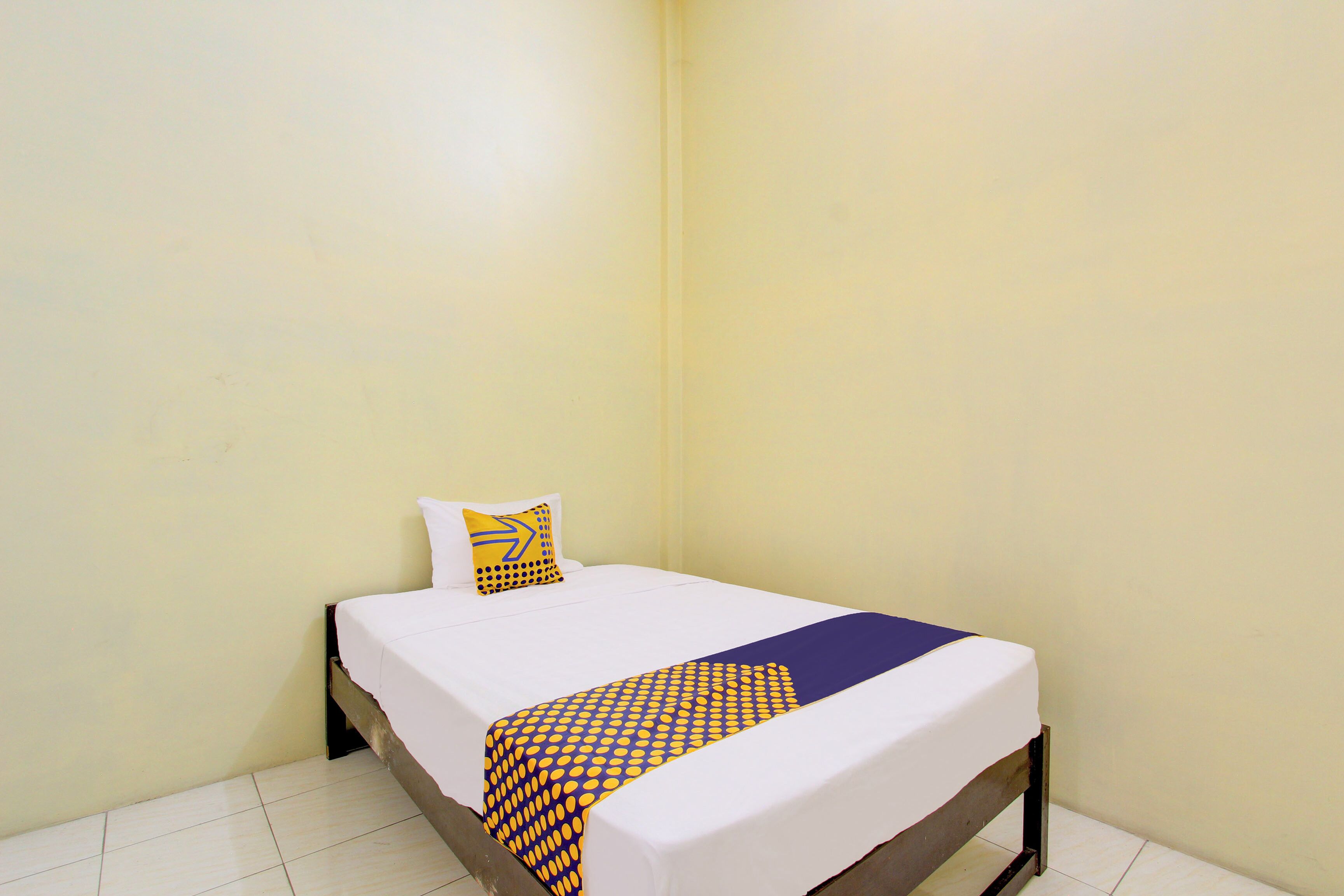 Spot On 93245 Guet House Mulia Dua Syariah