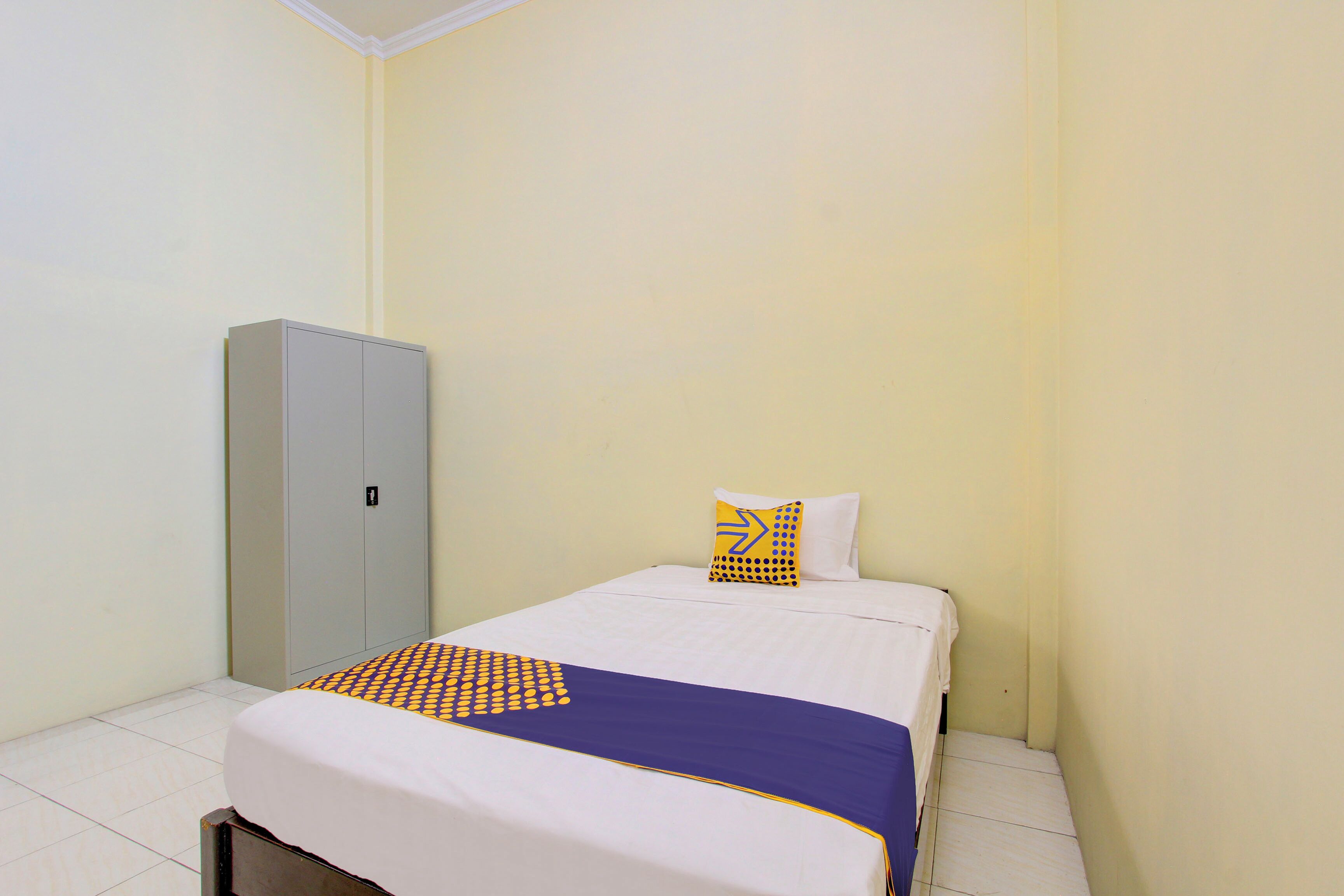 Spot On 93245 Guet House Mulia Dua Syariah