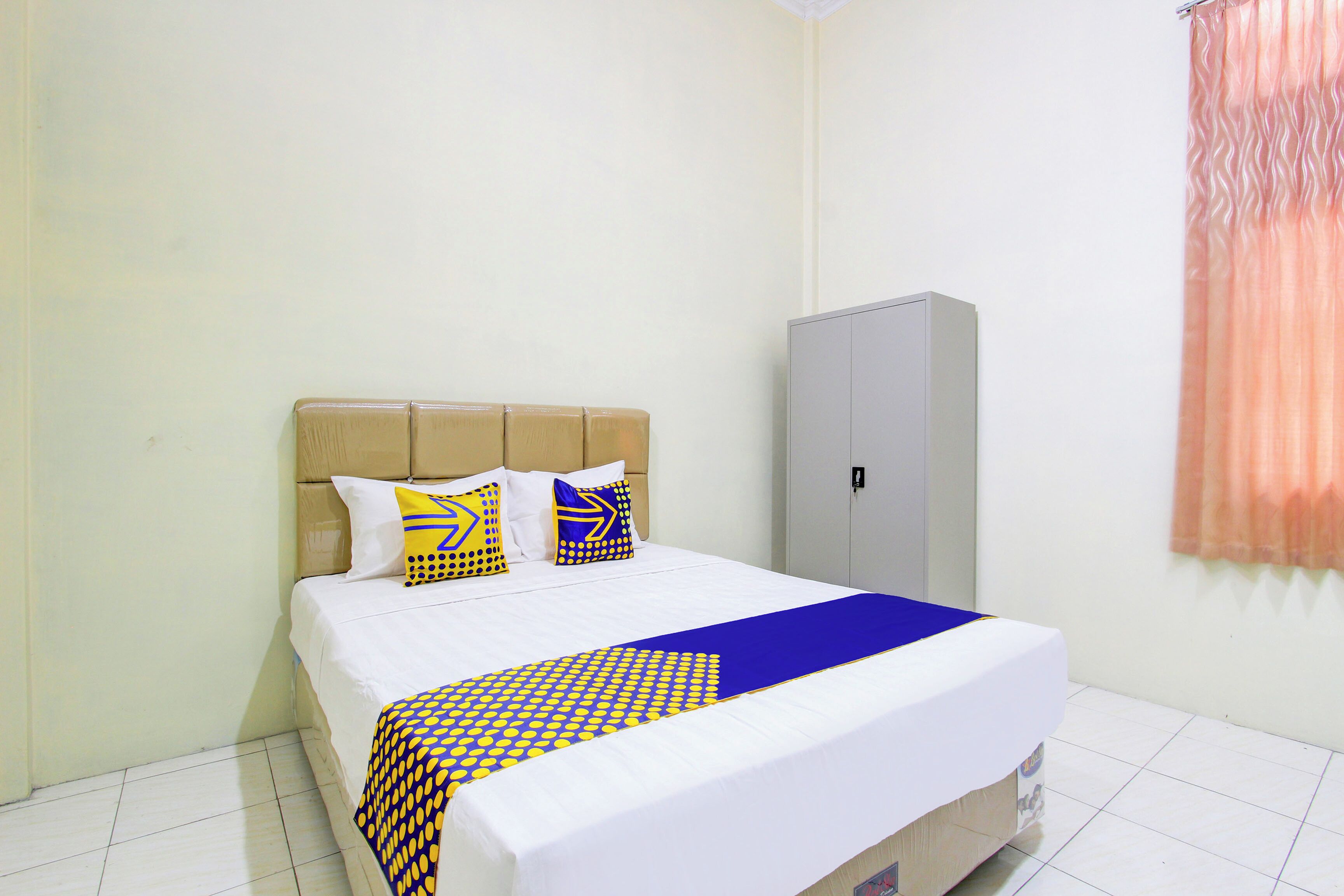 Spot On 93245 Guet House Mulia Dua Syariah