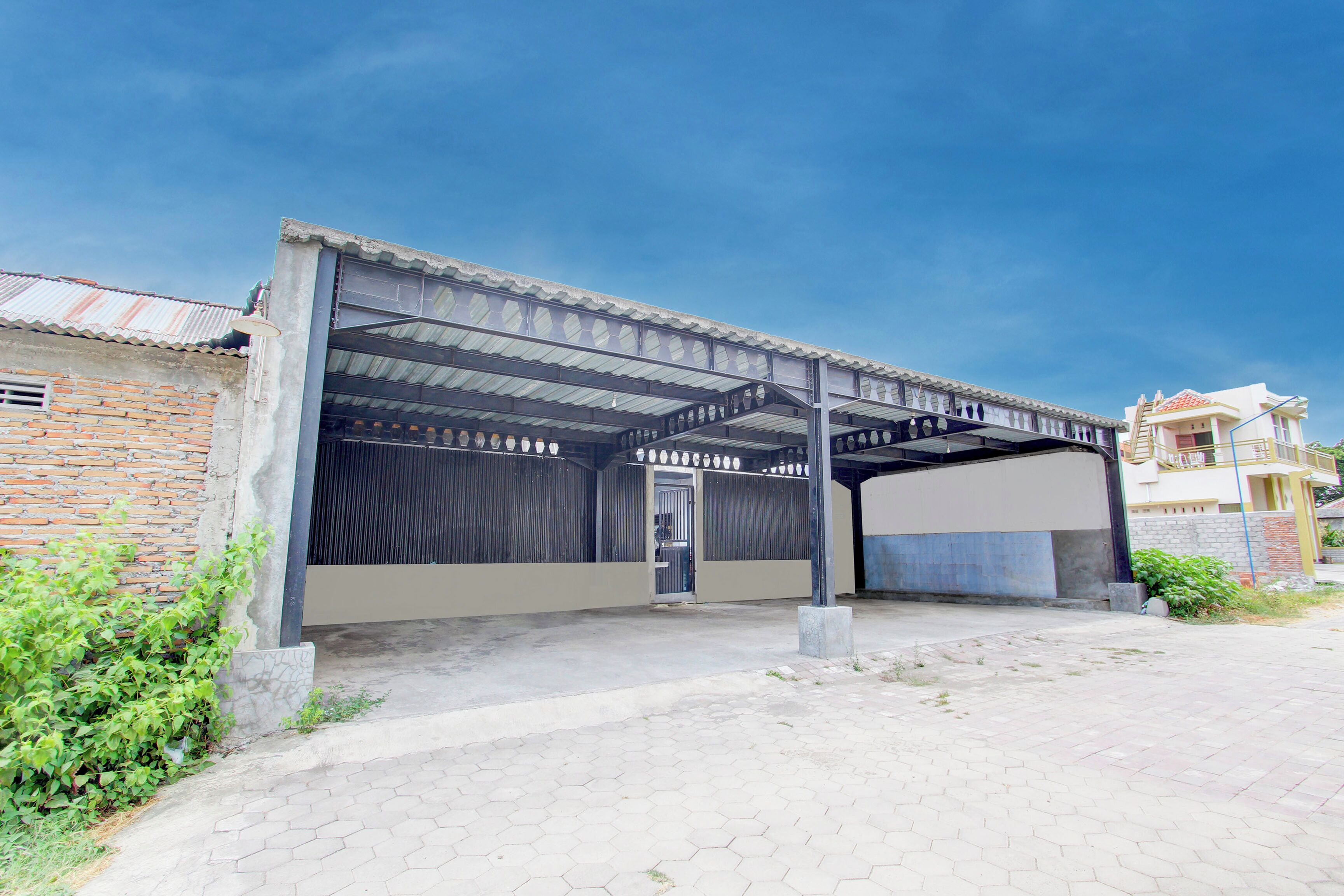 Spot On 93245 Guet House Mulia Dua Syariah