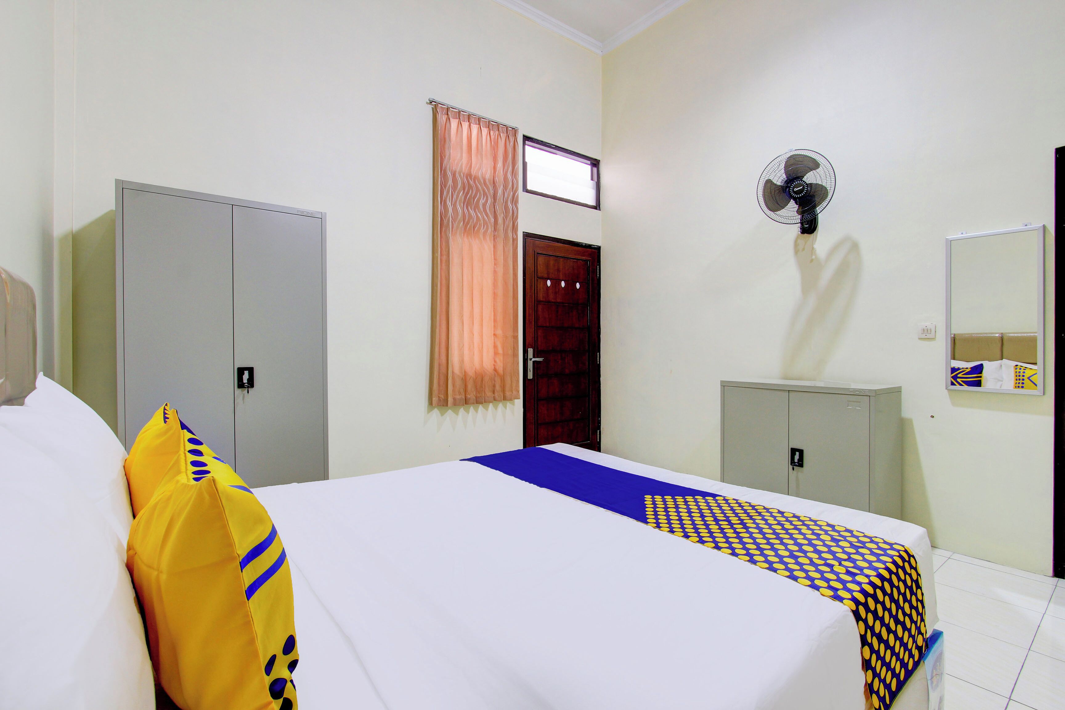 Spot On 93245 Guet House Mulia Dua Syariah