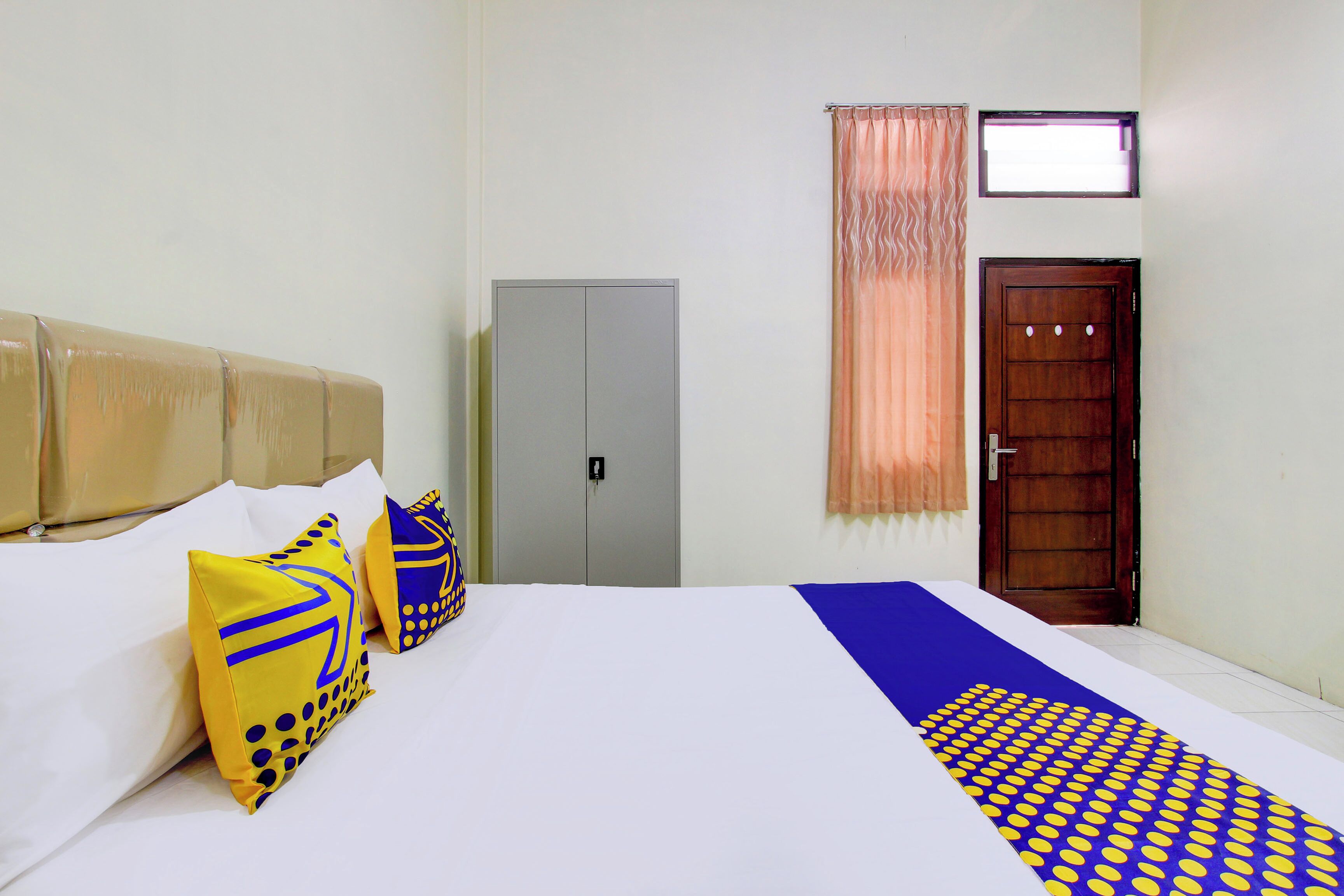 Spot On 93245 Guet House Mulia Dua Syariah