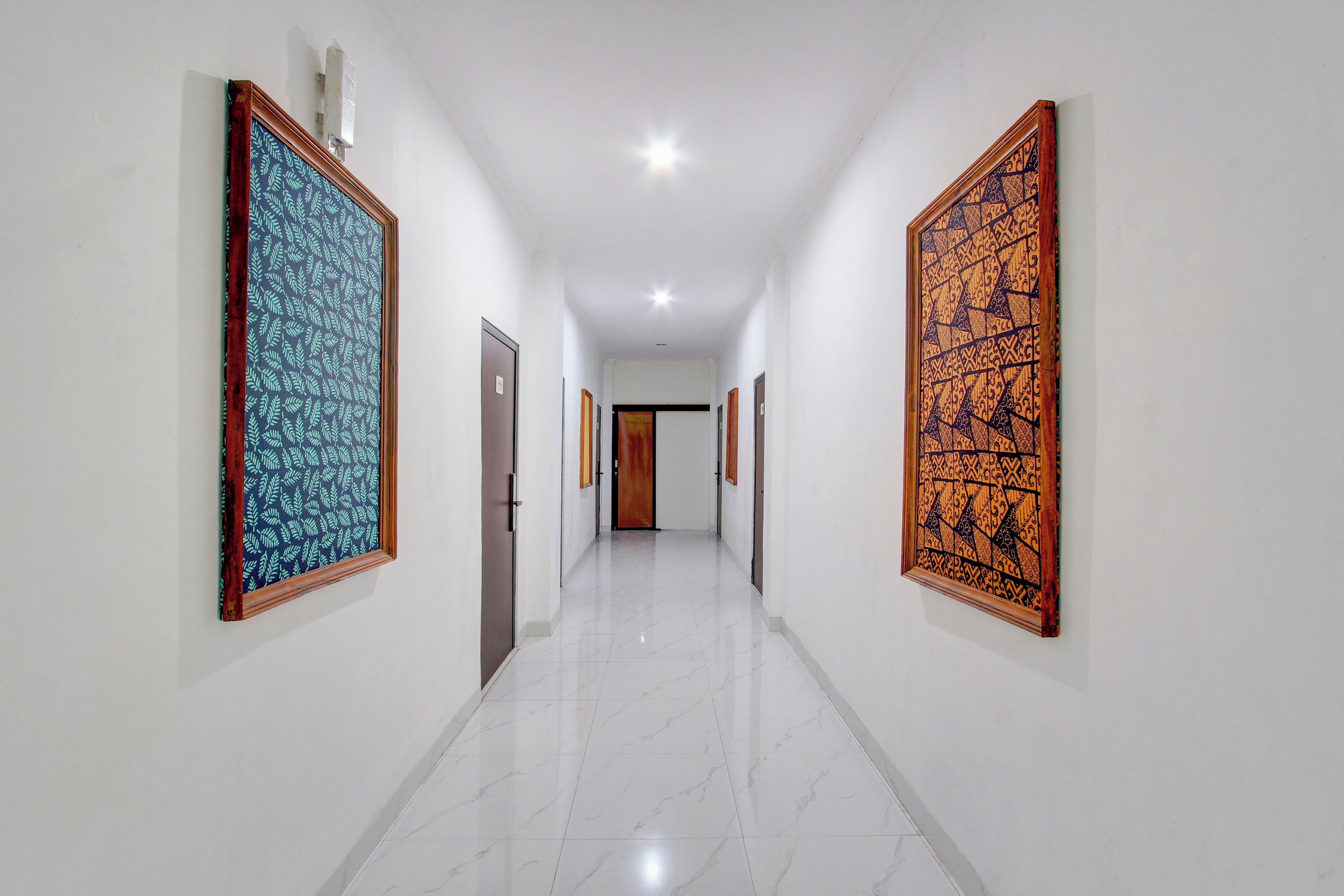 Capital O 93266 Palmier Hotel