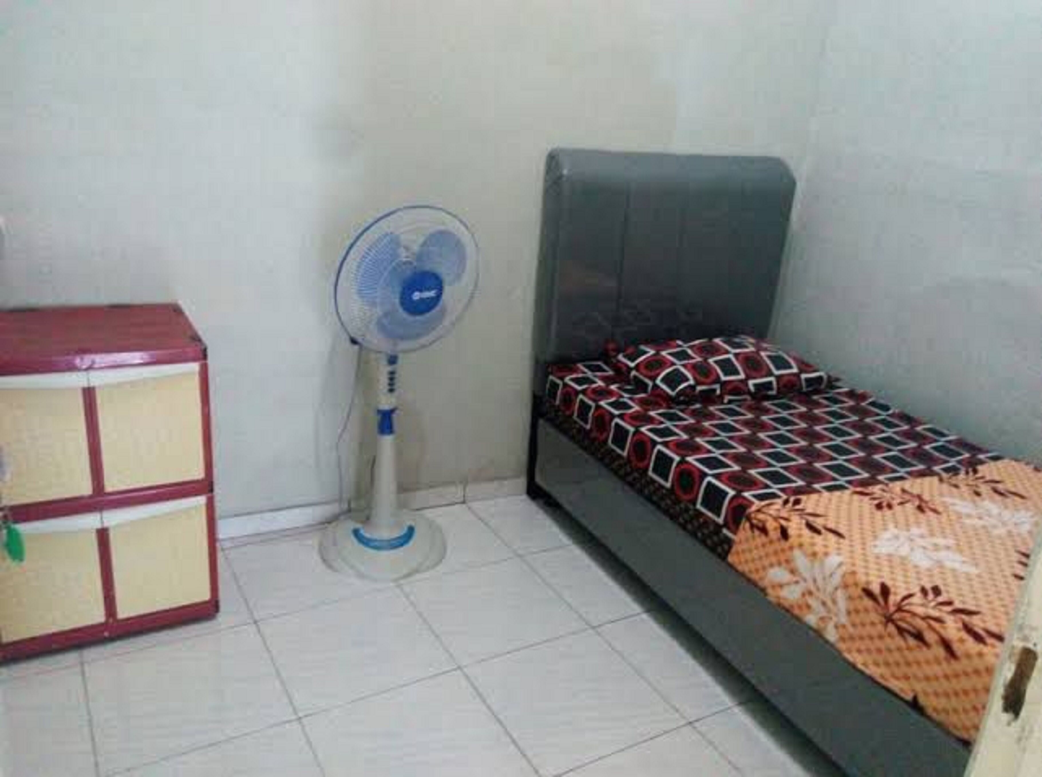 Spot On 91343 Kartika Guest House Syariah