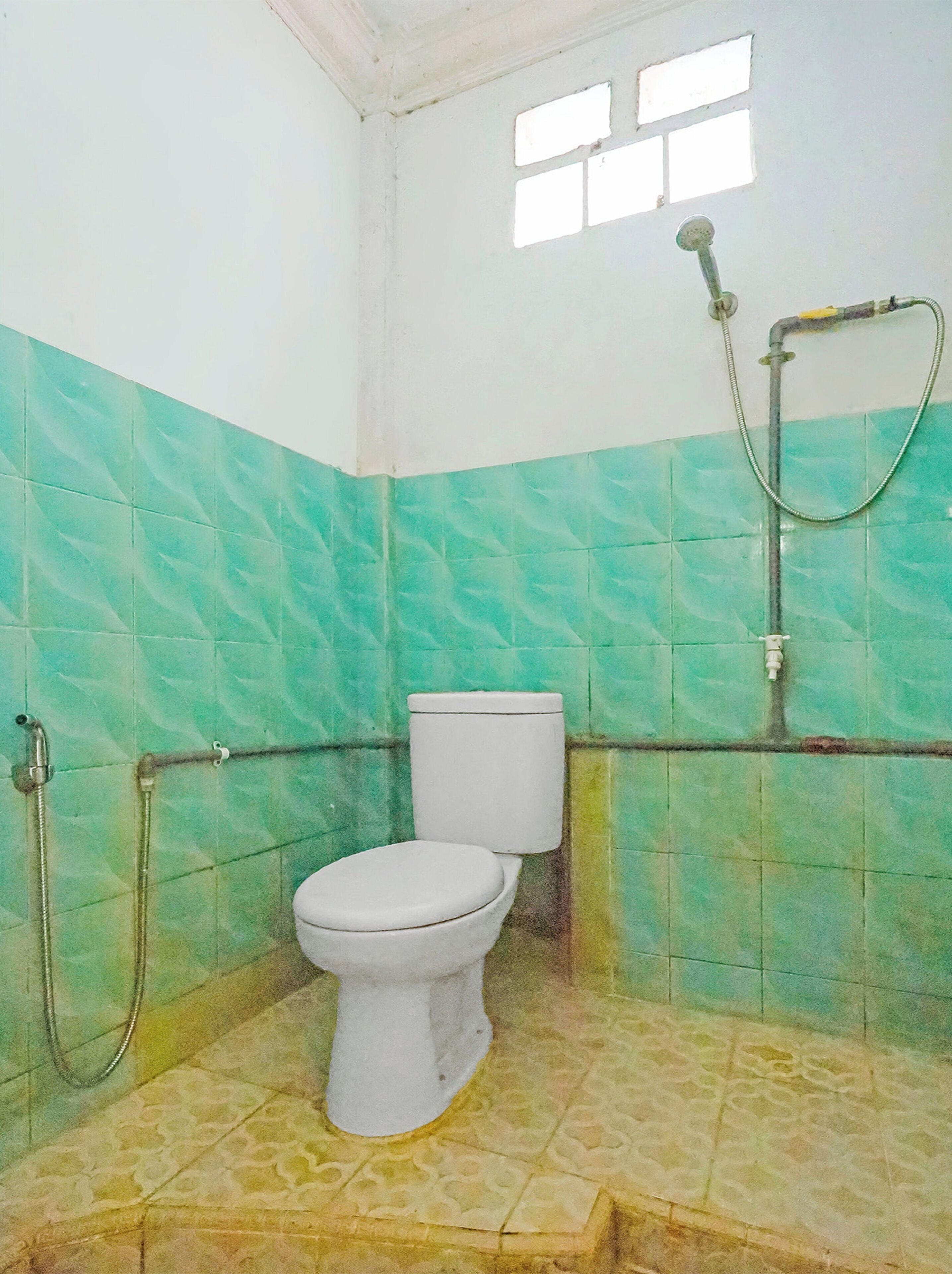 Spot On 92554 Budi Homestay Syariah