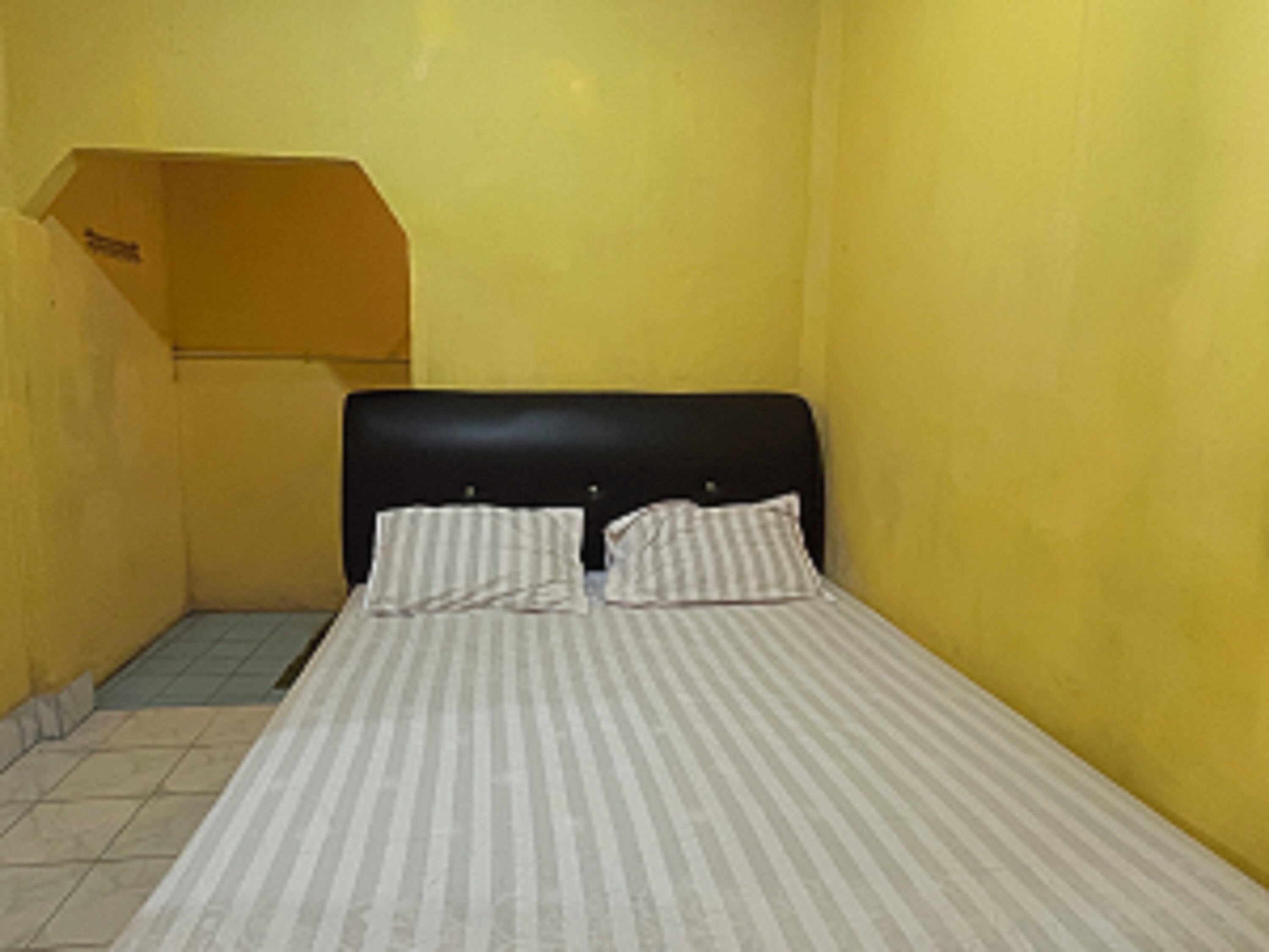 Spot on 92766 Penginapan Asoka Indah