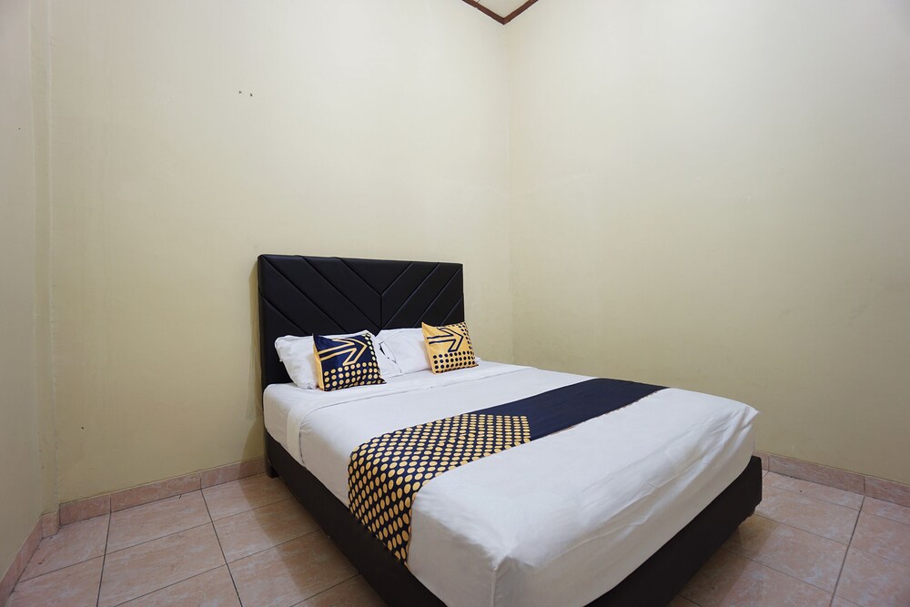 Tiga Mas Inn by OYO Rooms