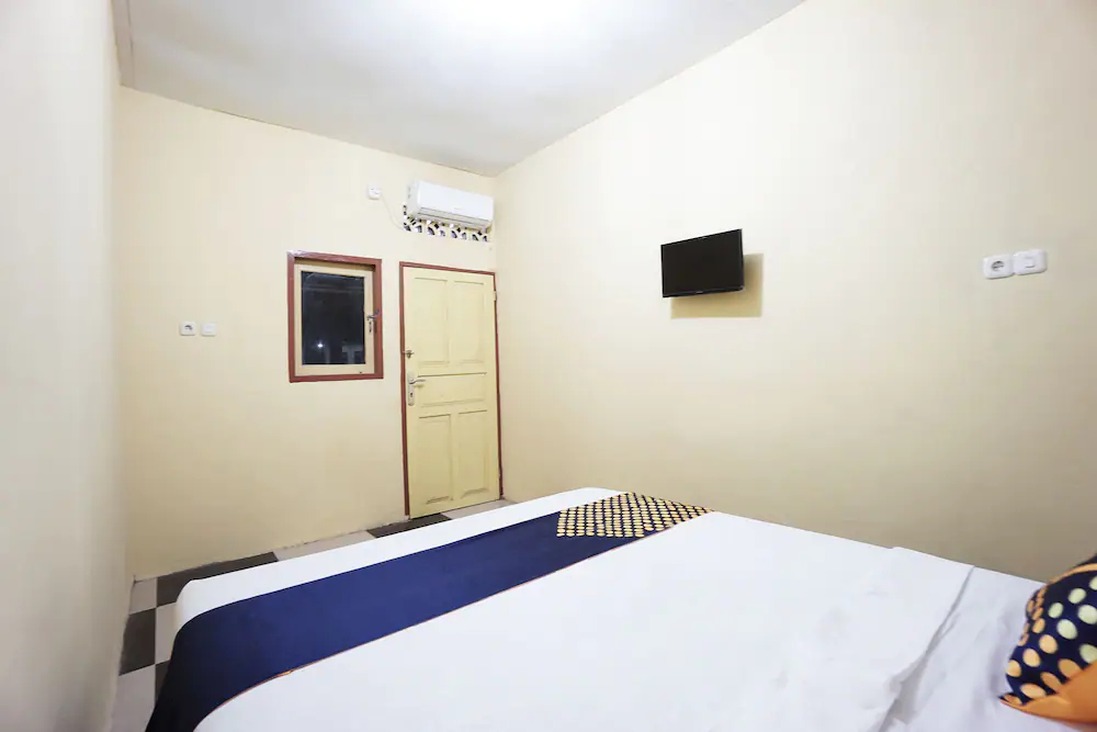 Tiga Mas Inn by OYO Rooms