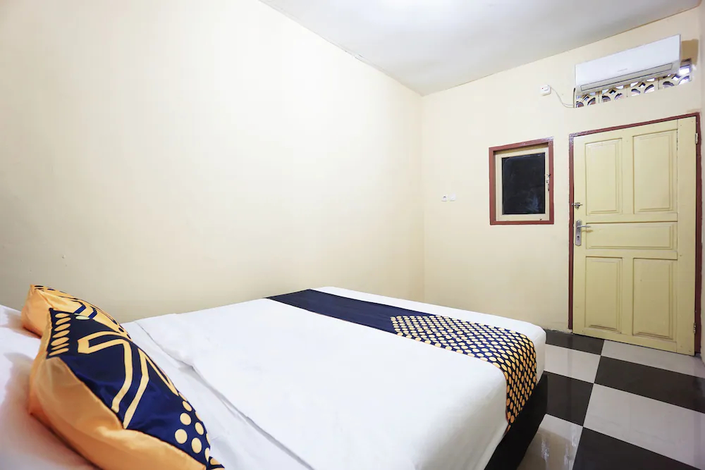 Tiga Mas Inn by OYO Rooms