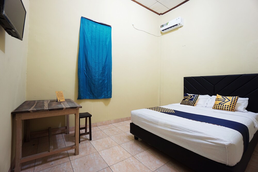 Tiga Mas Inn by OYO Rooms