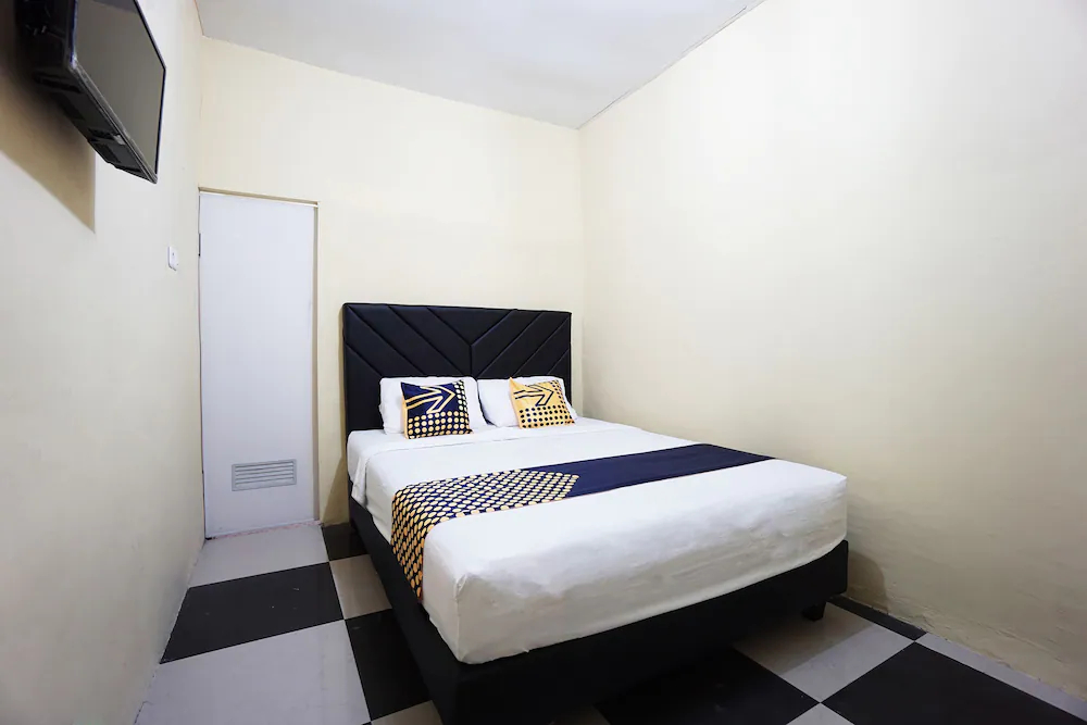 Tiga Mas Inn by OYO Rooms