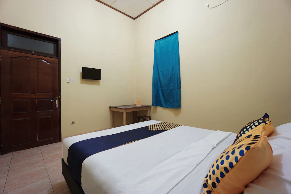 Tiga Mas Inn by OYO Rooms