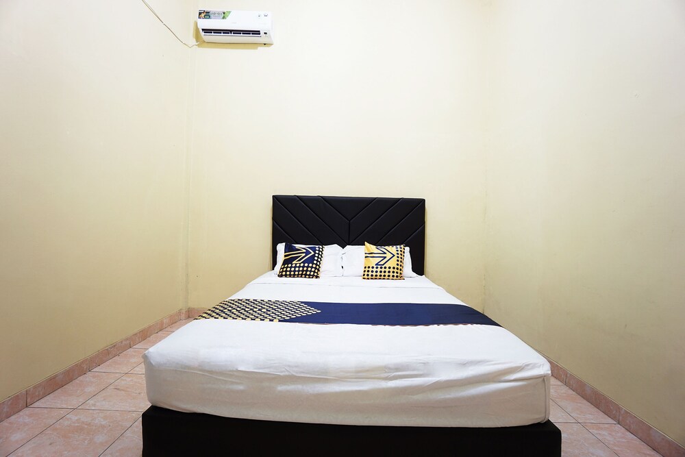 Tiga Mas Inn by OYO Rooms