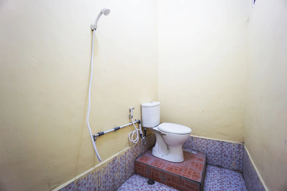 Tiga Mas Inn by OYO Rooms