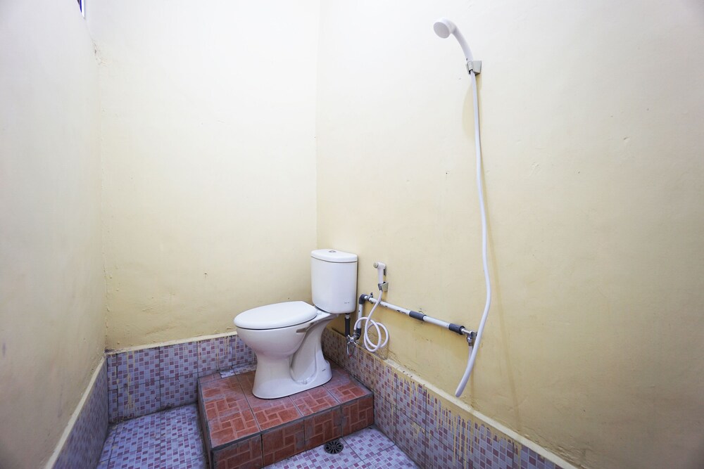 Tiga Mas Inn by OYO Rooms