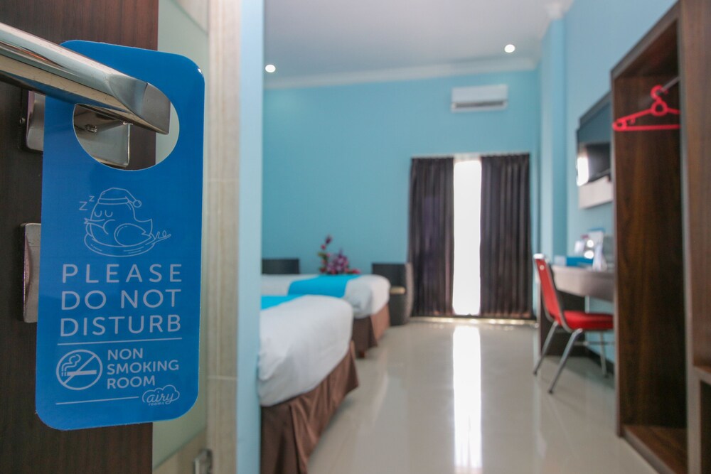 Purple Hotel Palu By Airy Rooms