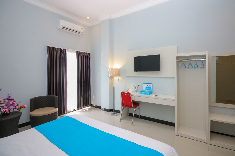 Purple Hotel Palu By Airy Rooms