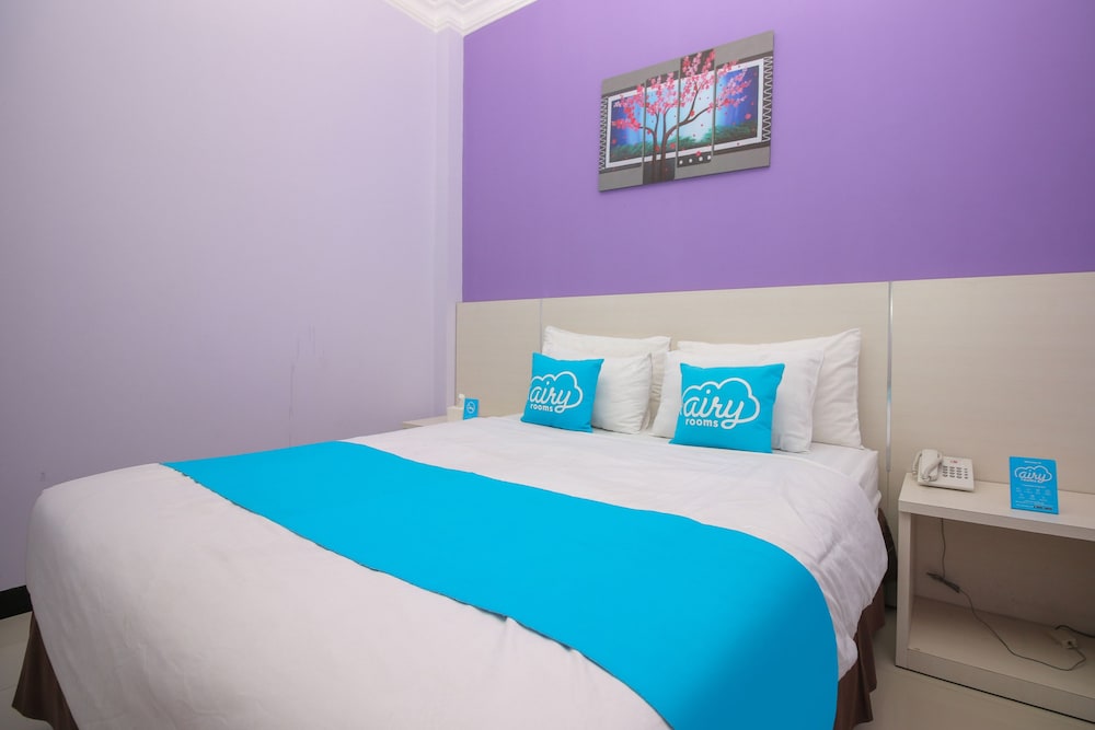 Purple Hotel Palu By Airy Rooms