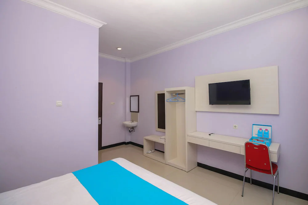 Purple Hotel Palu By Airy Rooms