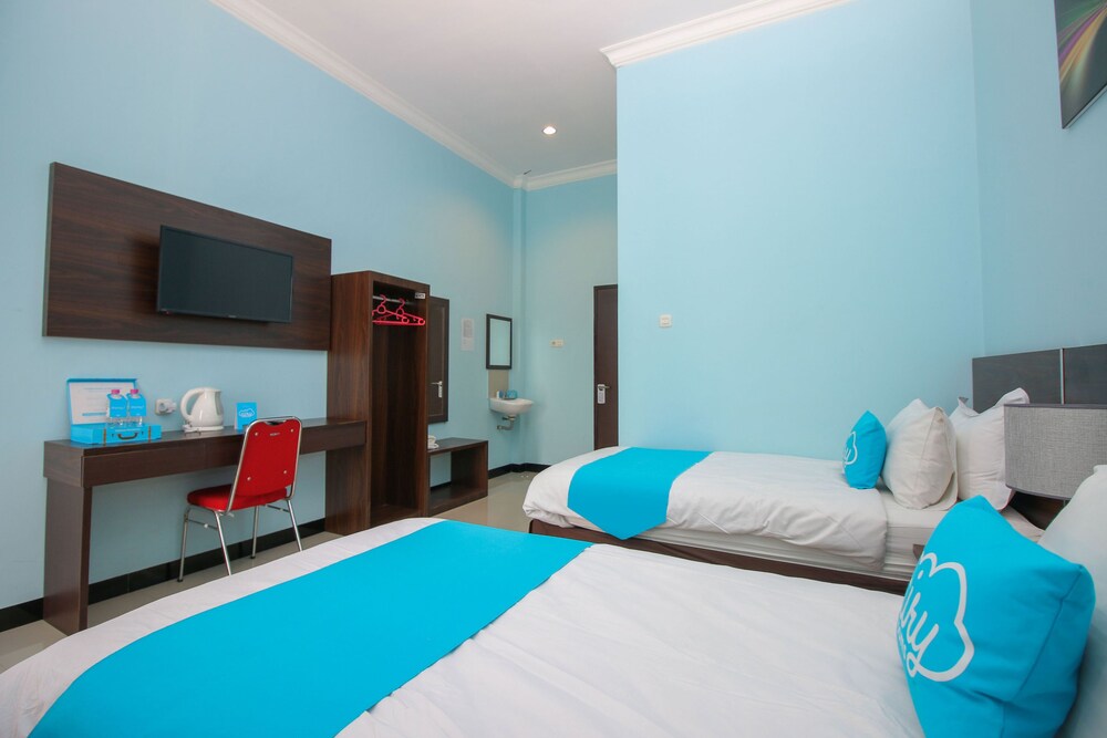 Purple Hotel Palu By Airy Rooms