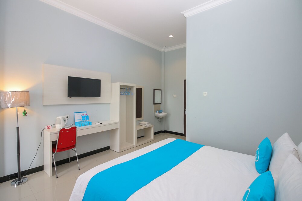 Purple Hotel Palu By Airy Rooms