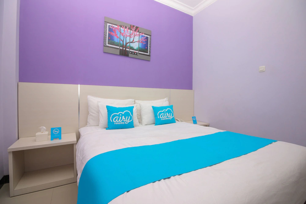 Purple Hotel Palu By Airy Rooms