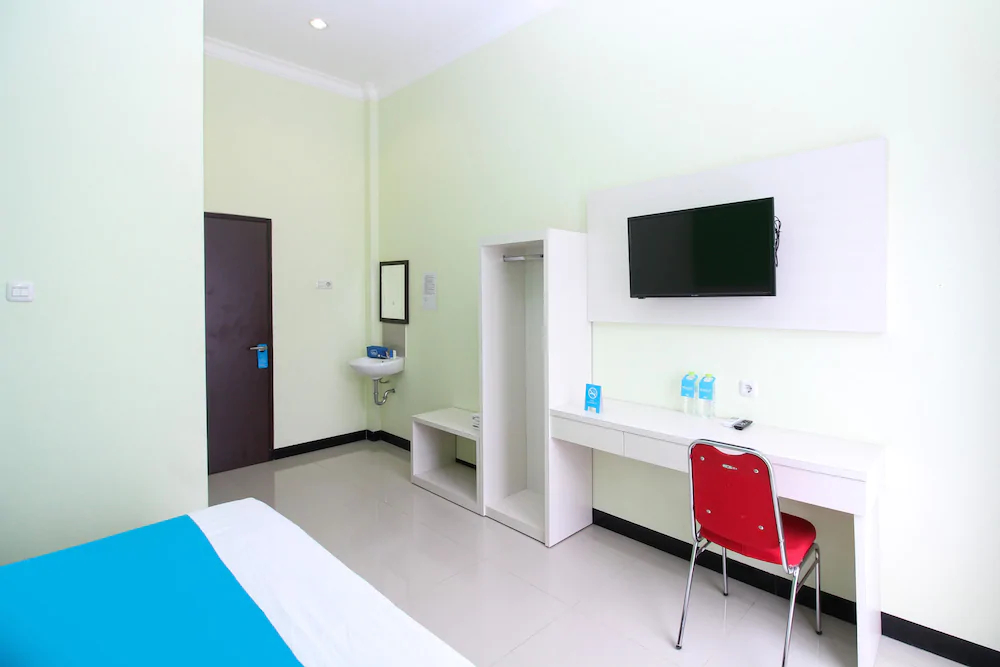 Purple Hotel Palu By Airy Rooms